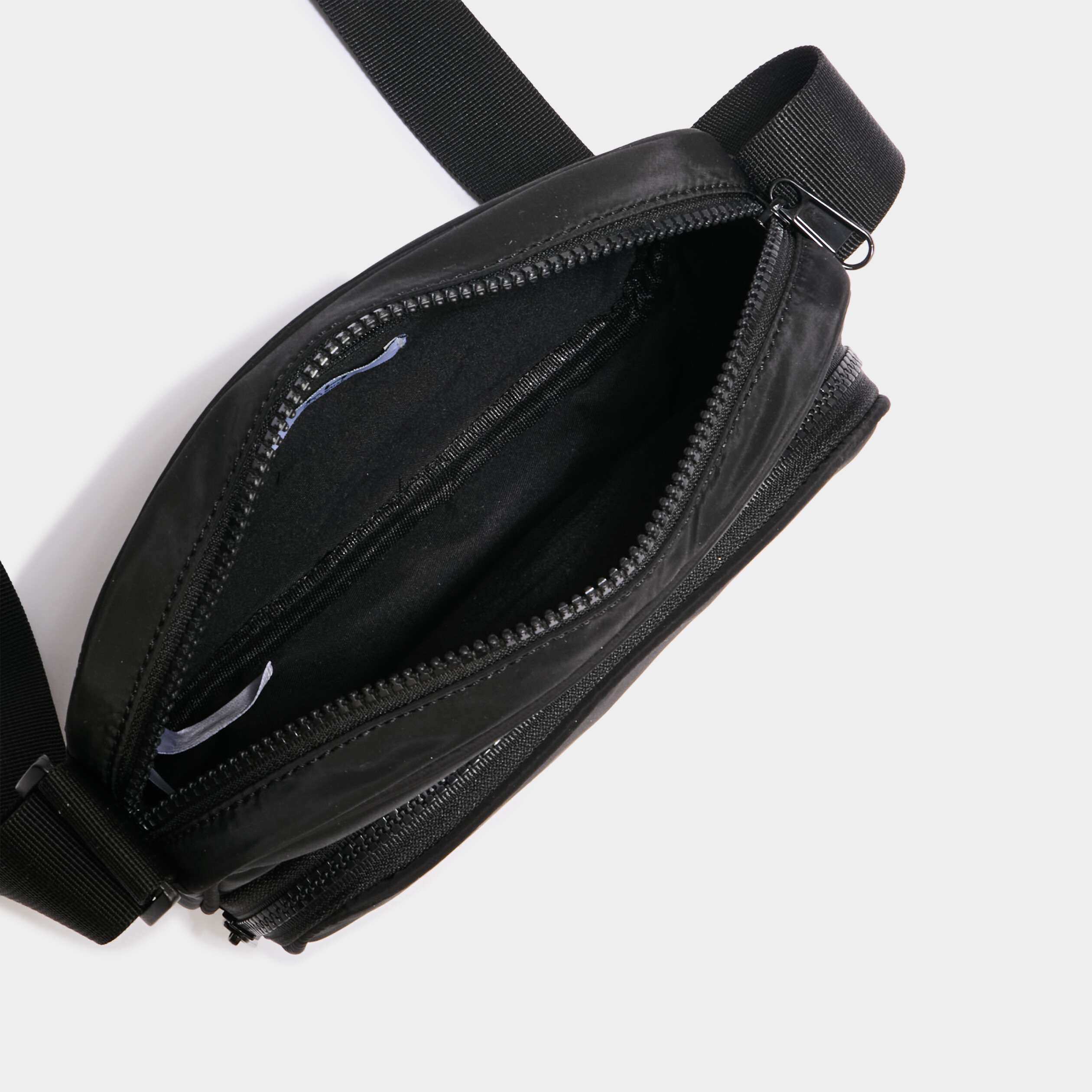 Sac arrondi en bandoulière noir femme