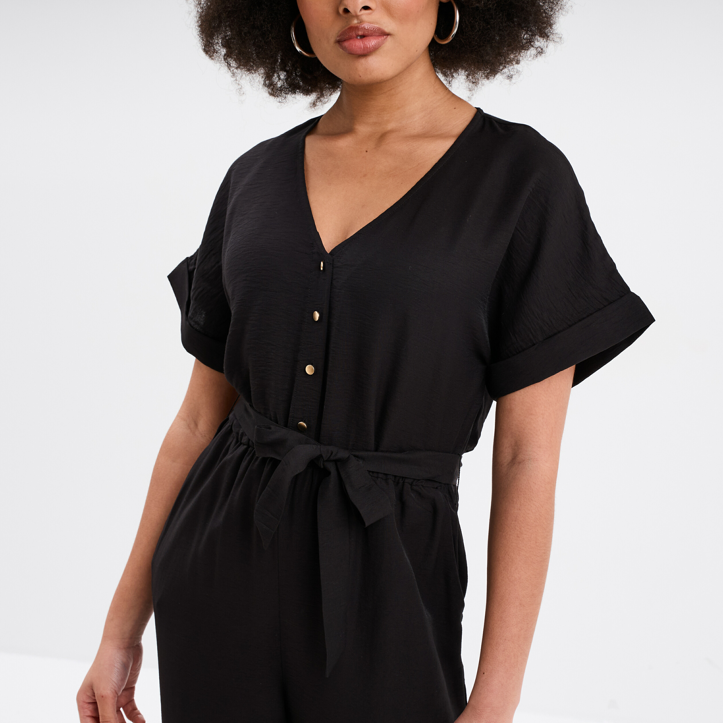 Combinaison pantalon ceintur&eacute;e col en V noir femme
