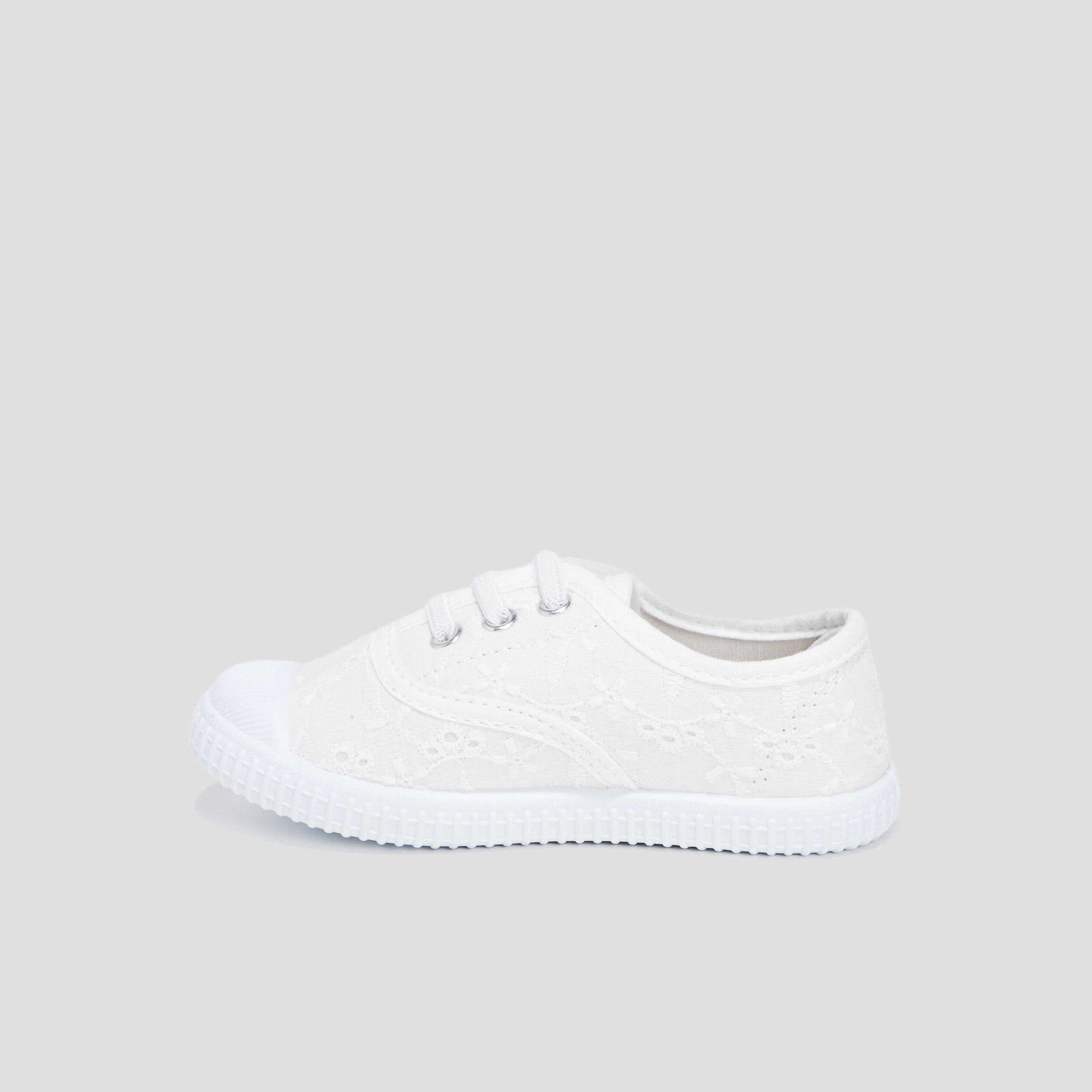 Tennis en toile avec bout renforc&eacute; blanc fille