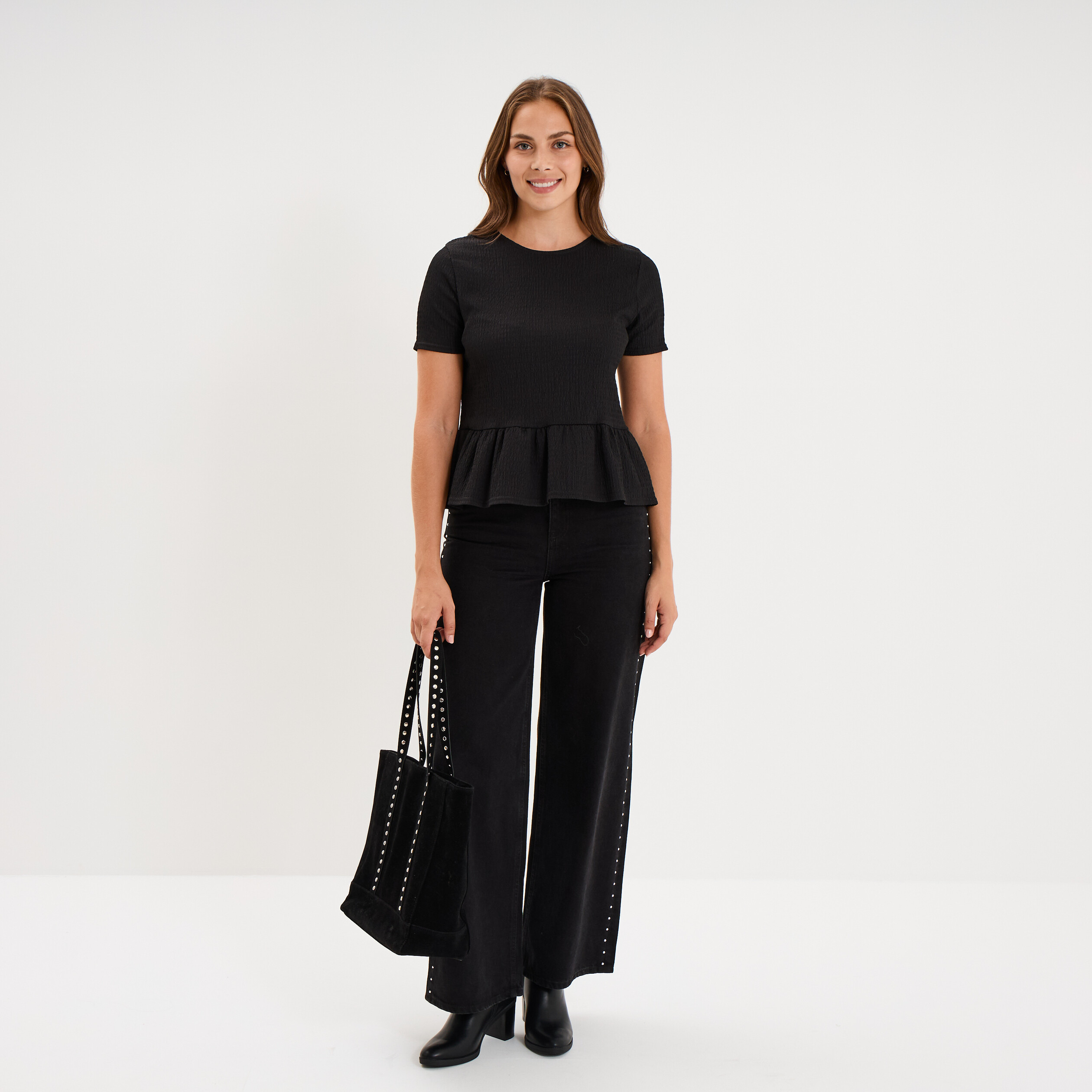 T-shirt gaufr&eacute; taille &agrave; volants noir femme