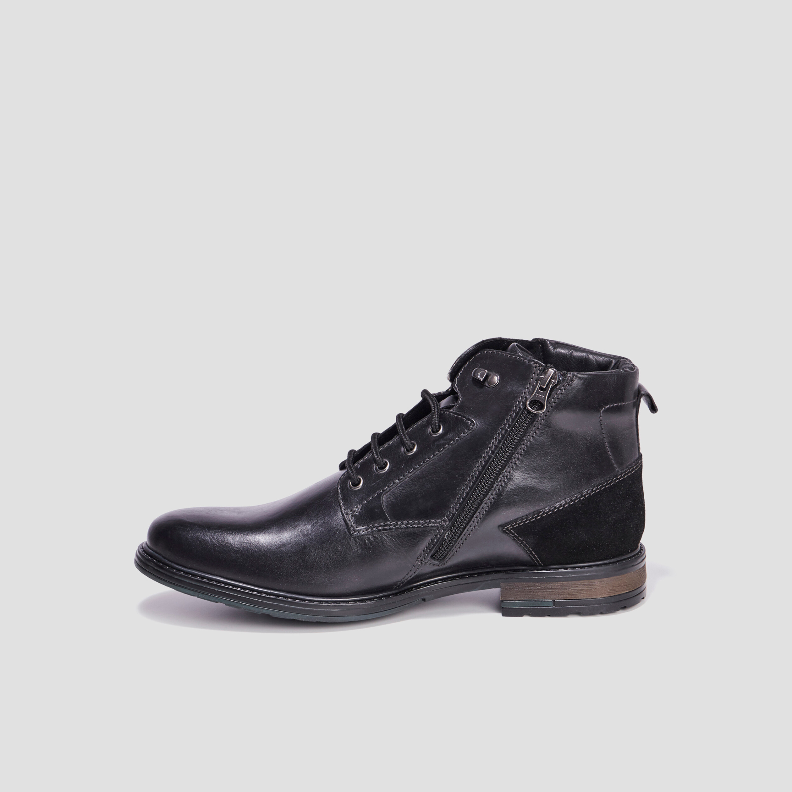 Boots zippées en cuir noir homme