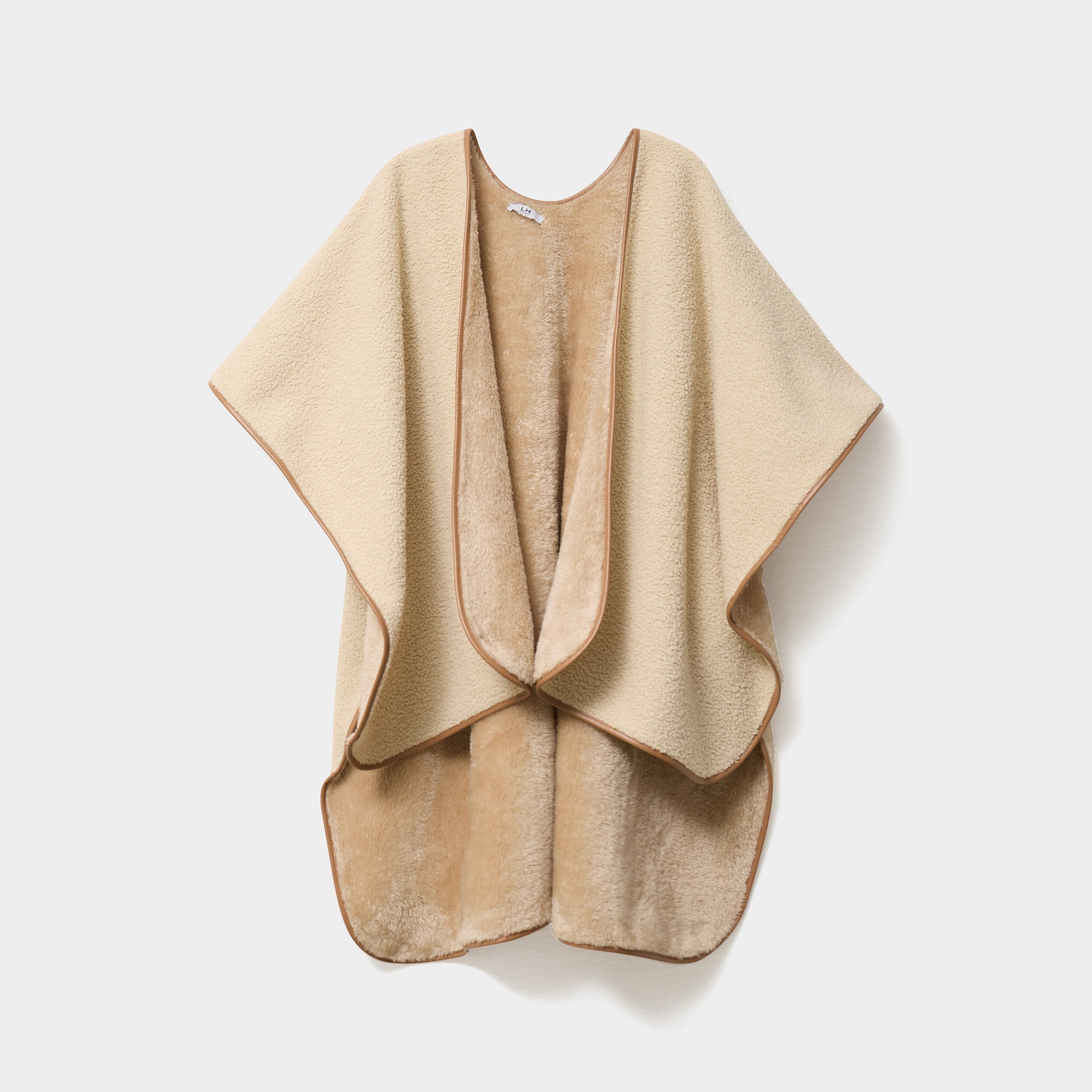 Poncho asym&eacute;trique polaire ivoire femme