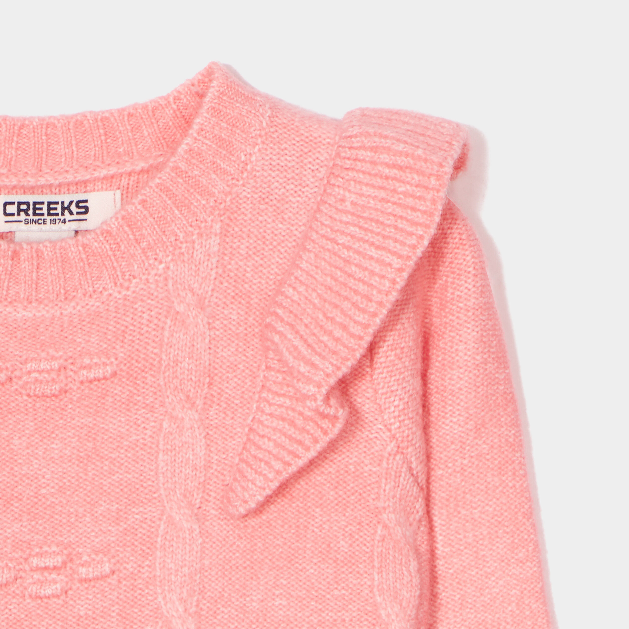 Pull à volants et torsades Creeks rose bébé fille