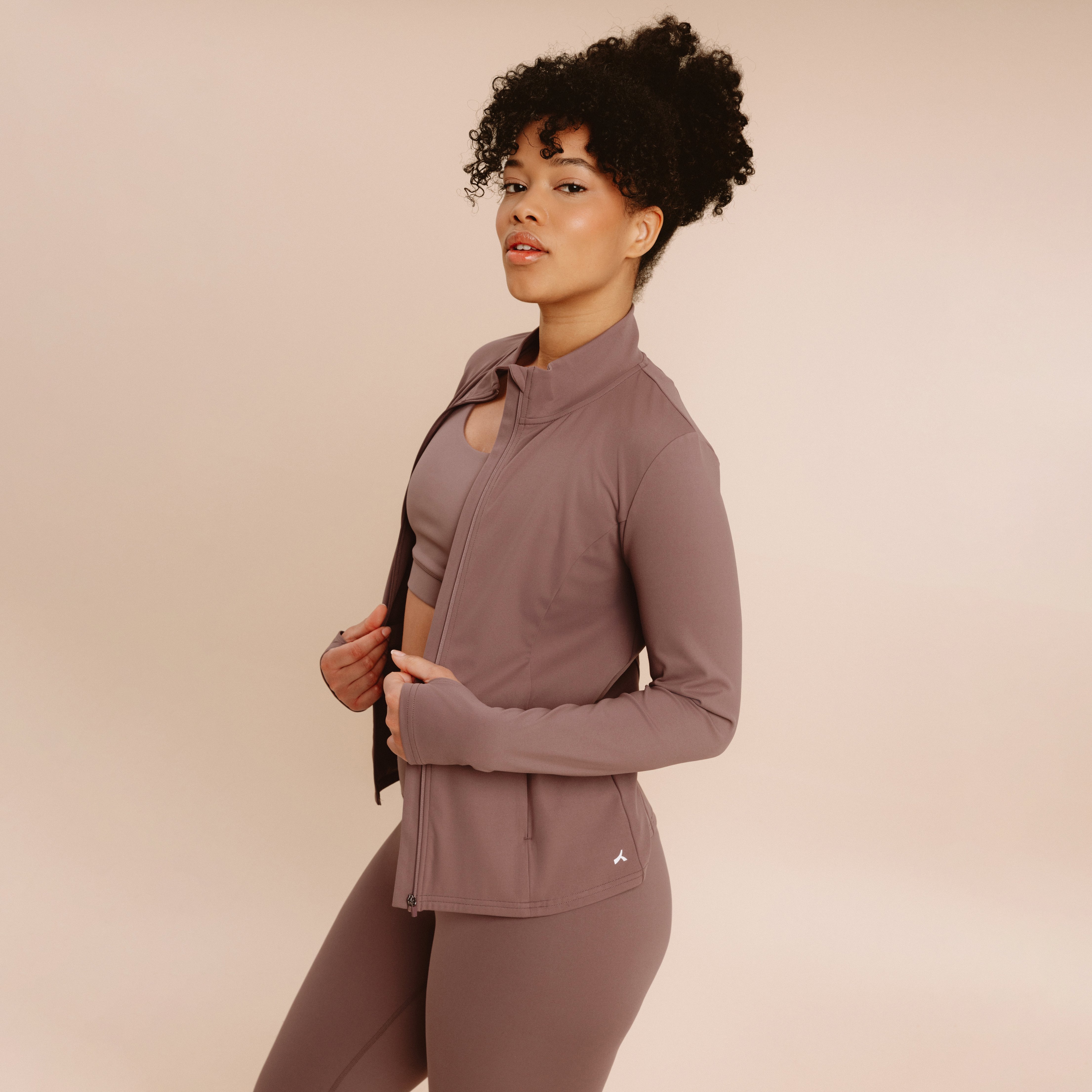 Veste de sport ajust&eacute;e avec fermeture mauve femme