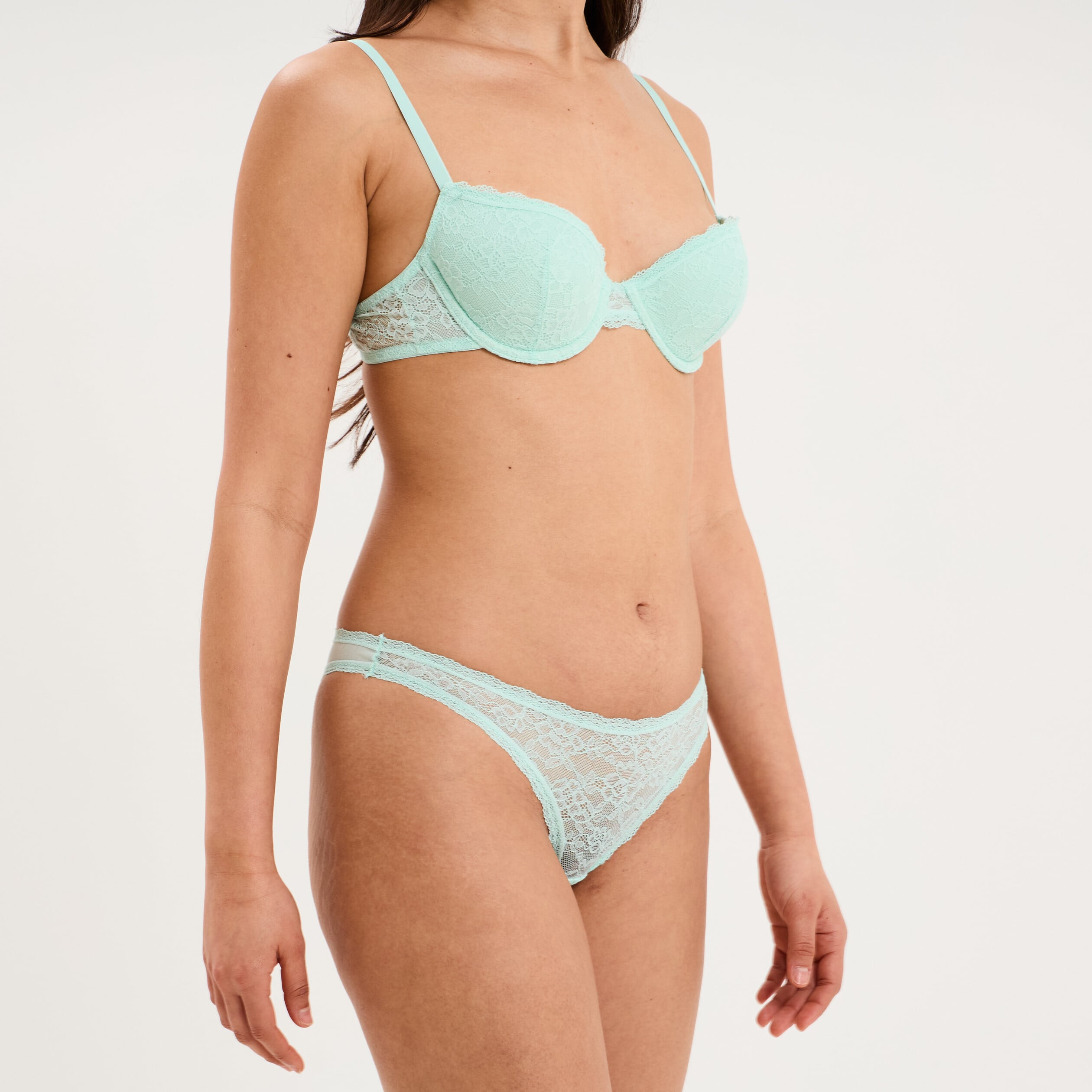 Tanga en dentelle doublure coton vert turquoise femme