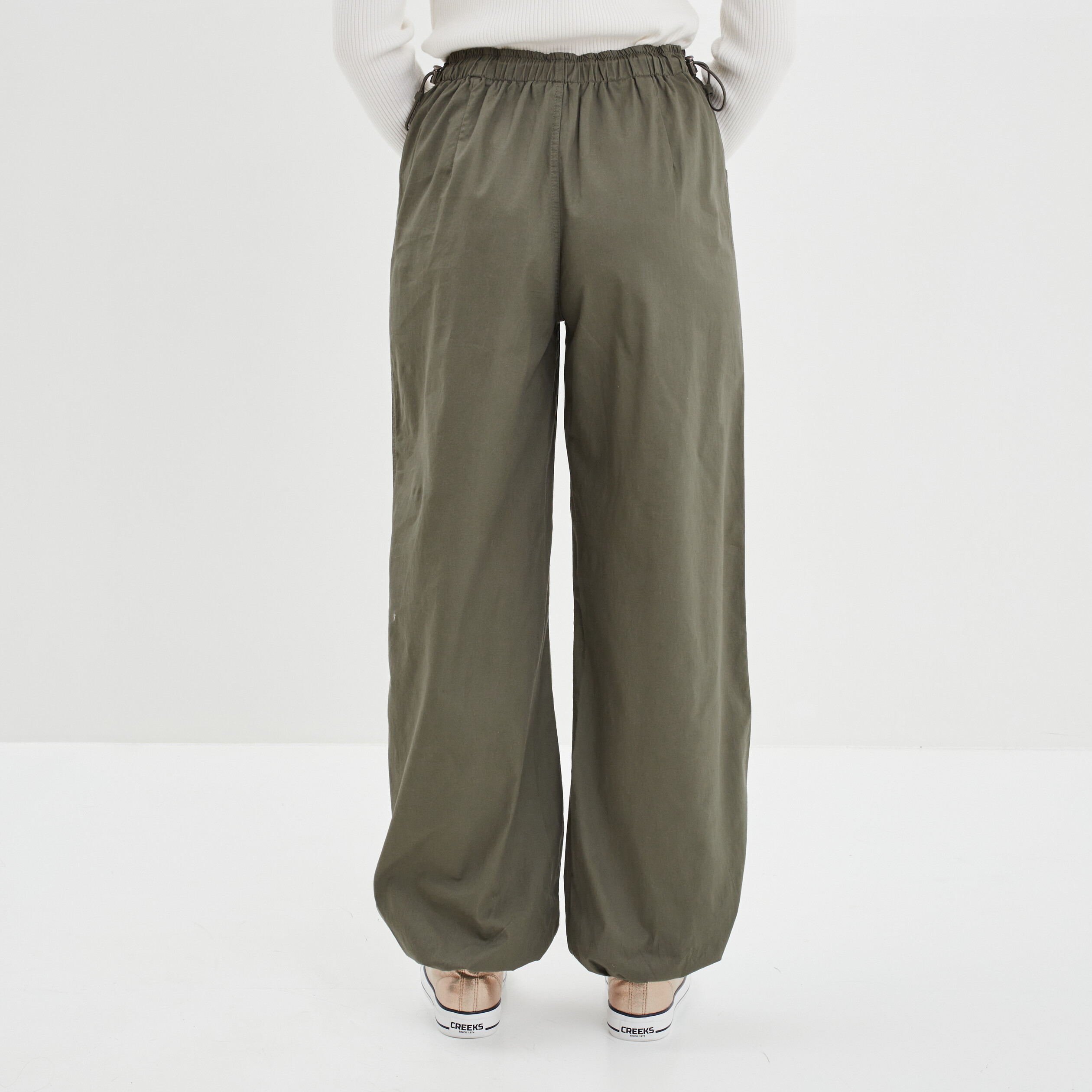 Pantalon large resserré en bas deals