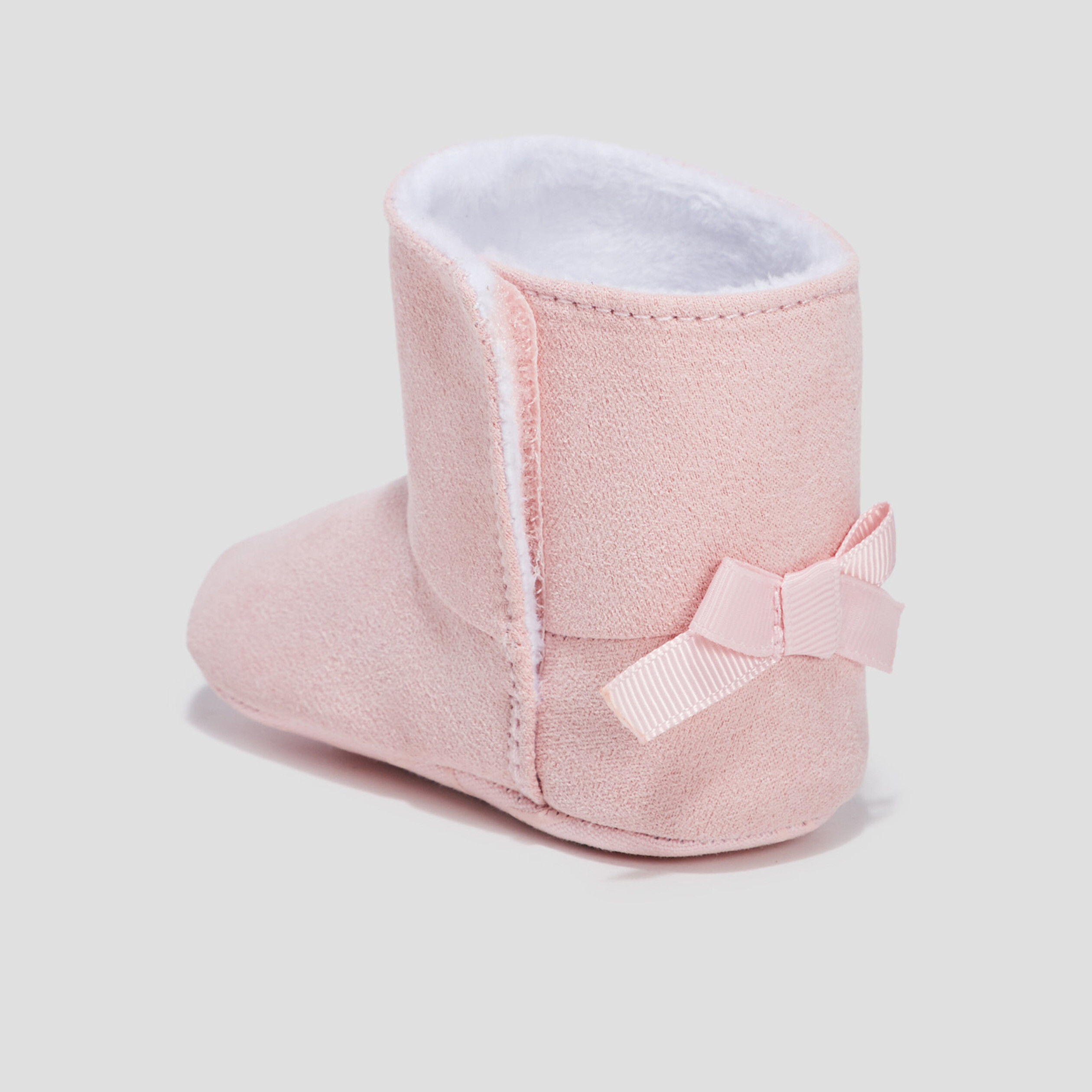 Bottines avec noeuds rose bébé fille