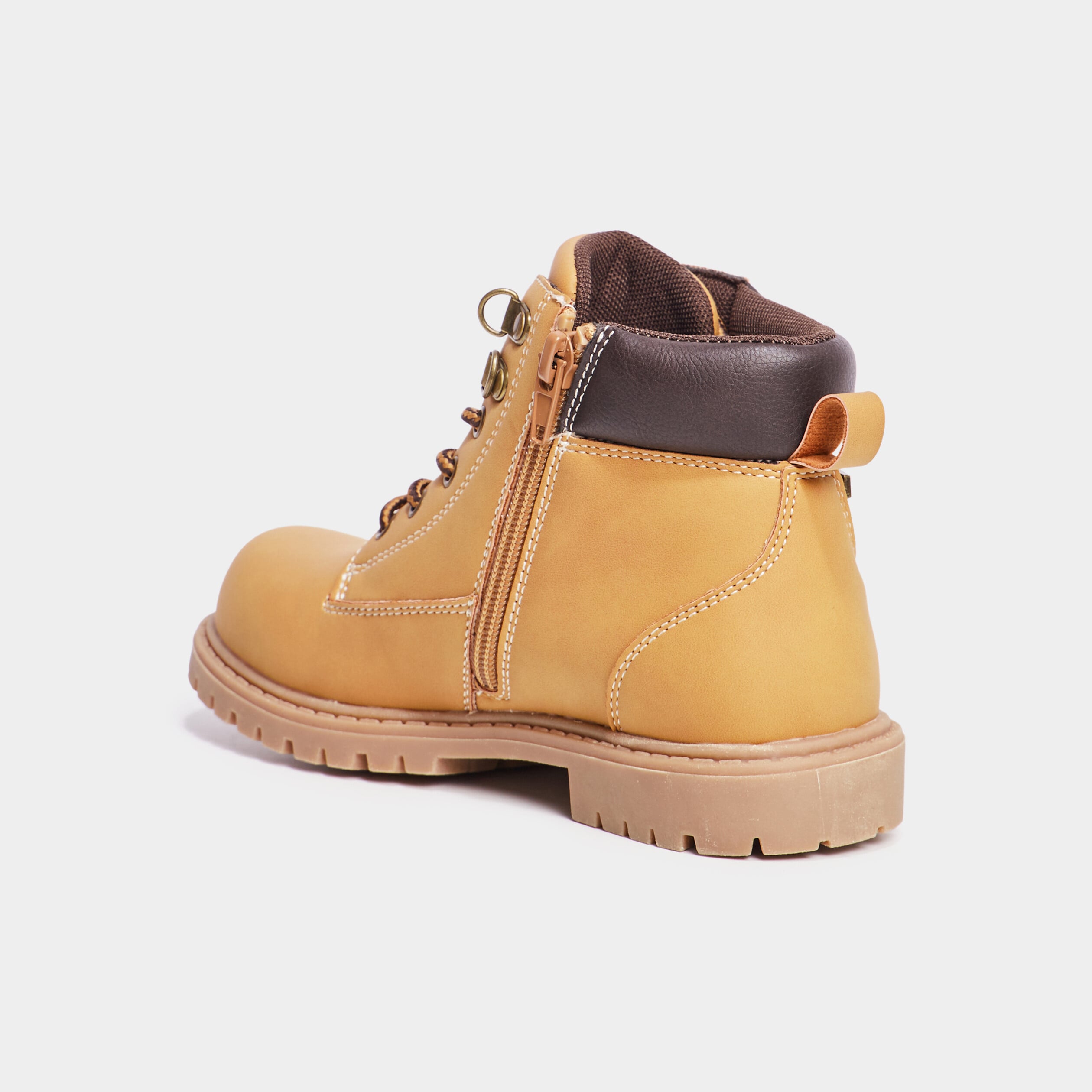 Boots crant&eacute;es zipp&eacute;es Trappeur jaune gar&ccedil;on