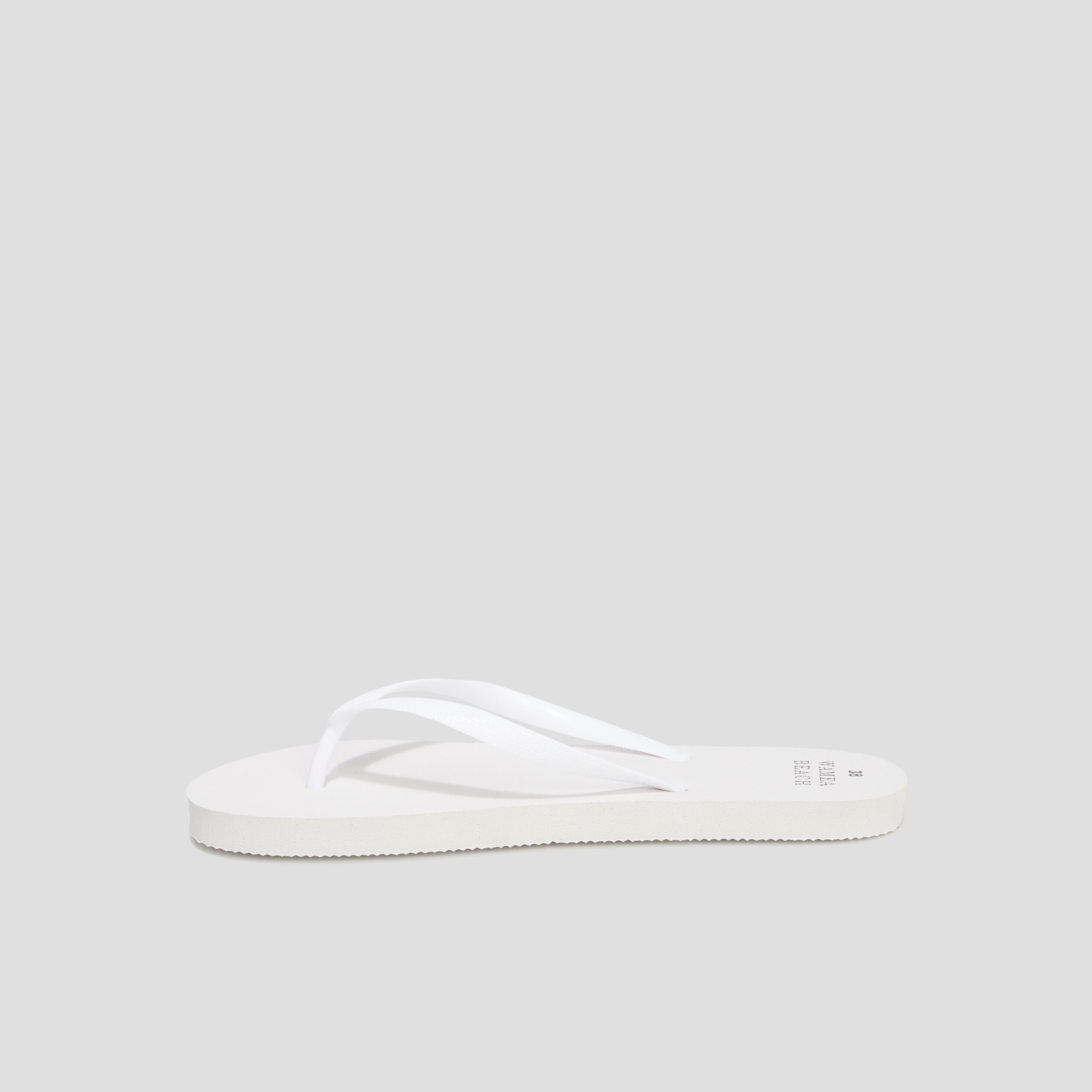 Tongs semelle plate blanc femme