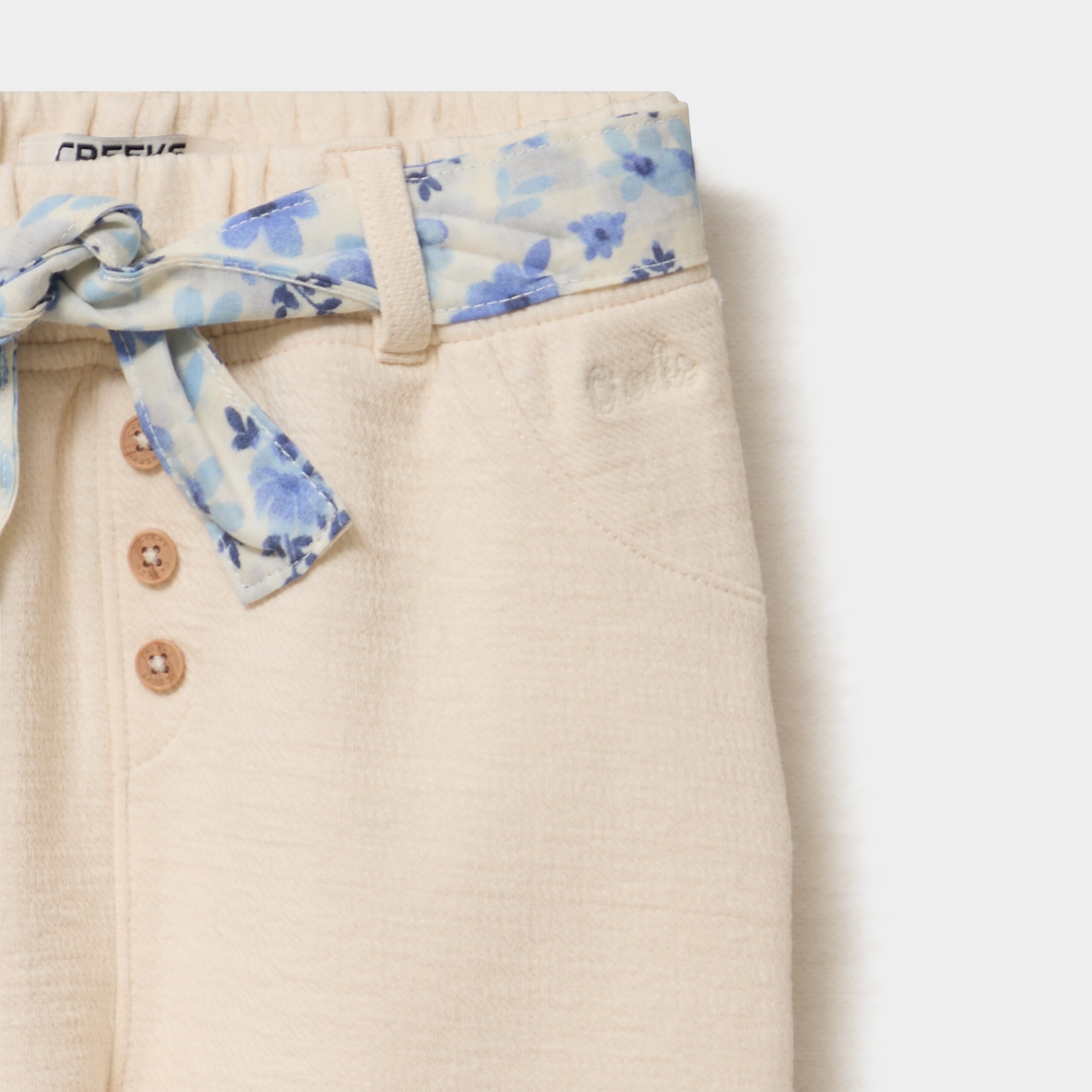 Pantalon cigarette en maille &agrave; ceinture creme b&eacute;b&eacute; fille