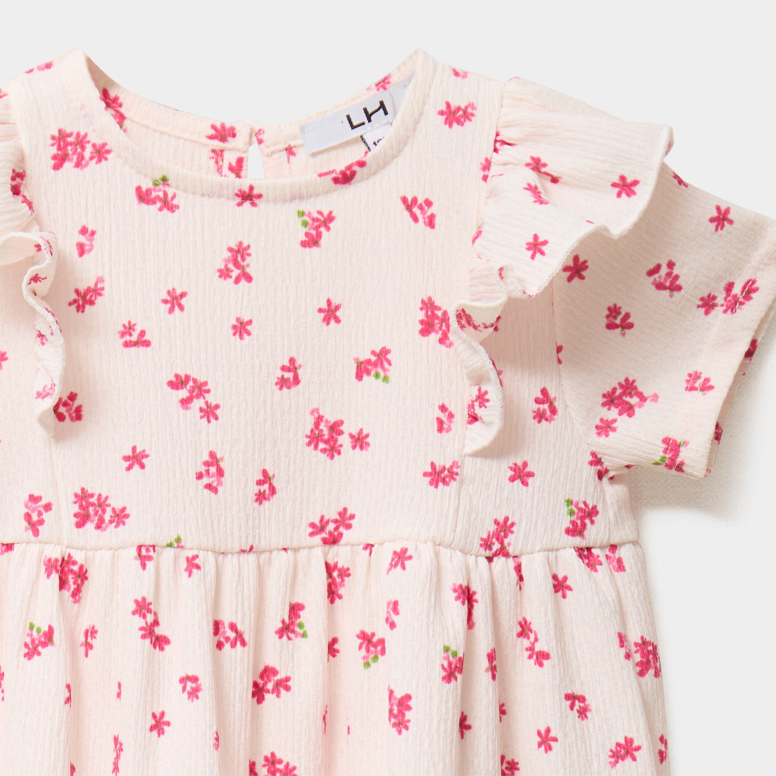 robe evasee avec volants blanc bebef Robe évasée avec volants blanc bébé fille
