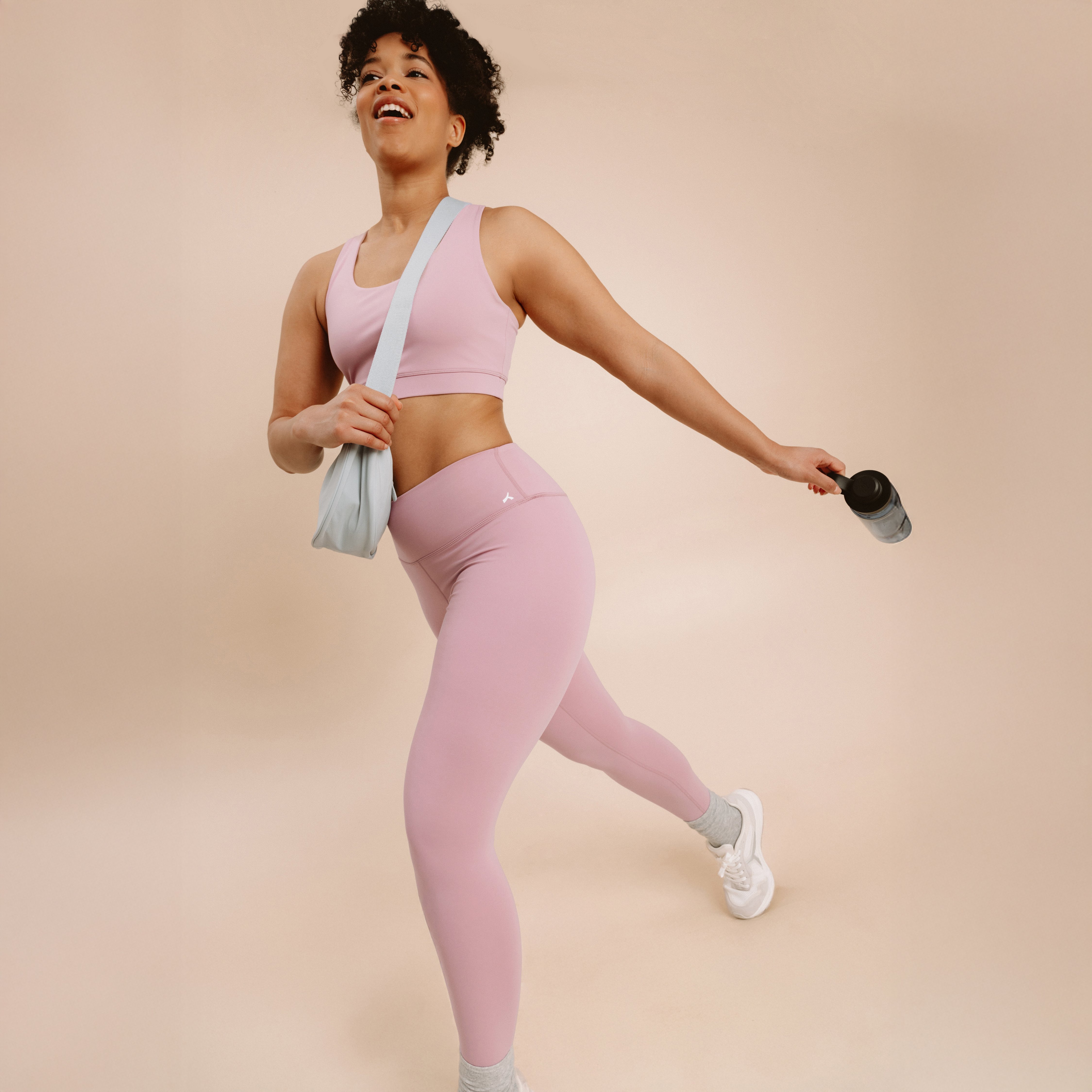 Legging de sport gainant taille haute mauve femme