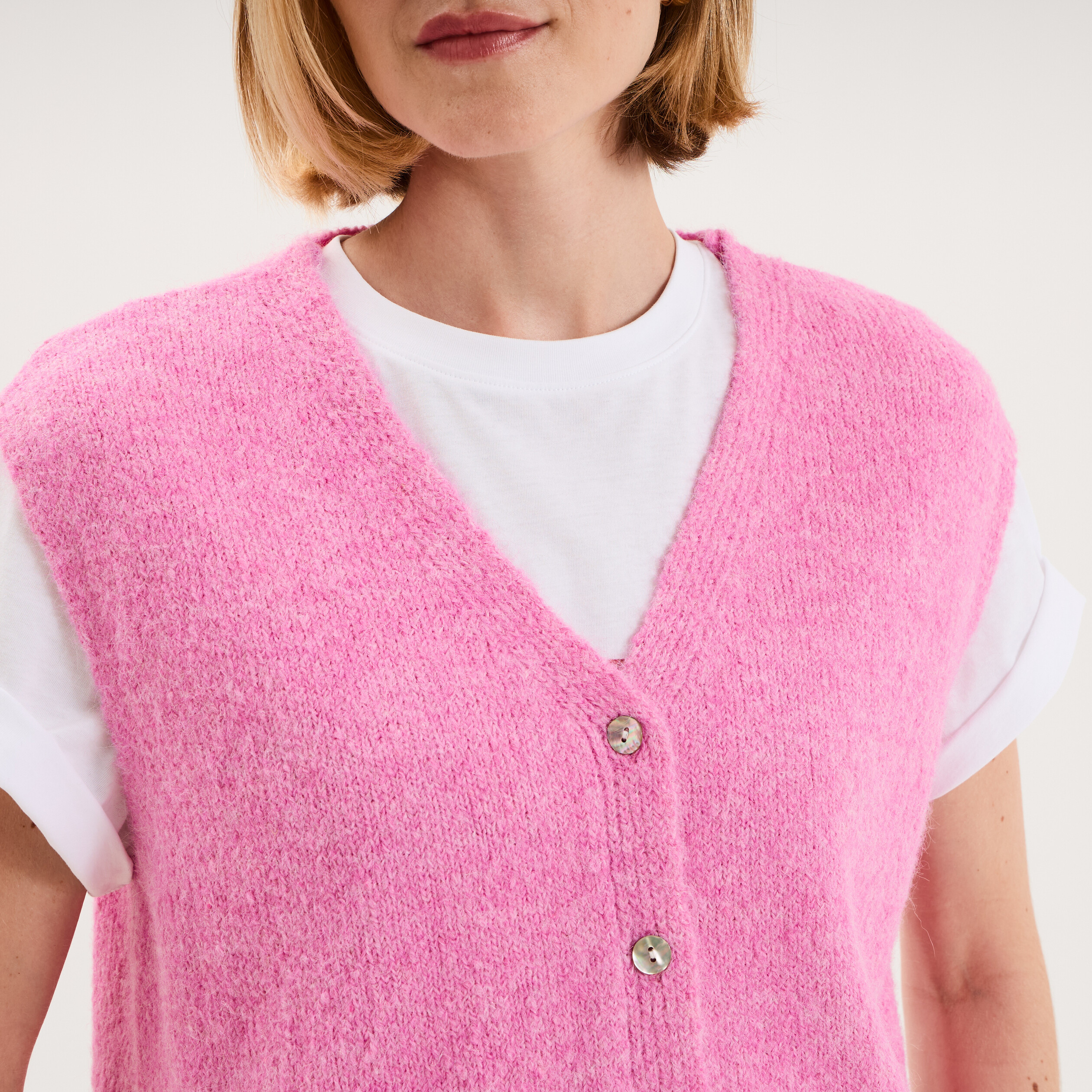 Gilet sans manches col V boutonn&eacute; rose femme