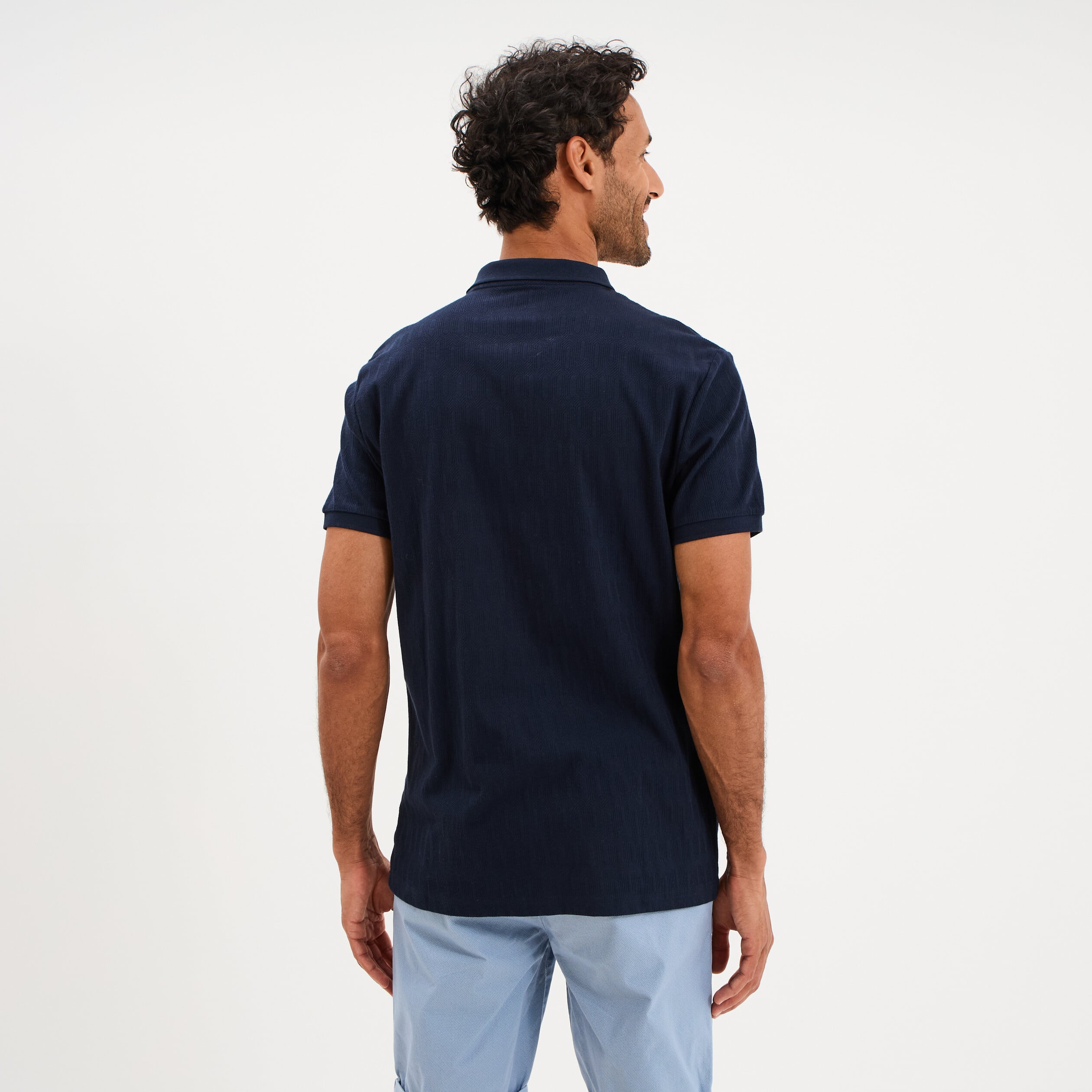 Polo textur&eacute; manches courtes bleu marine homme