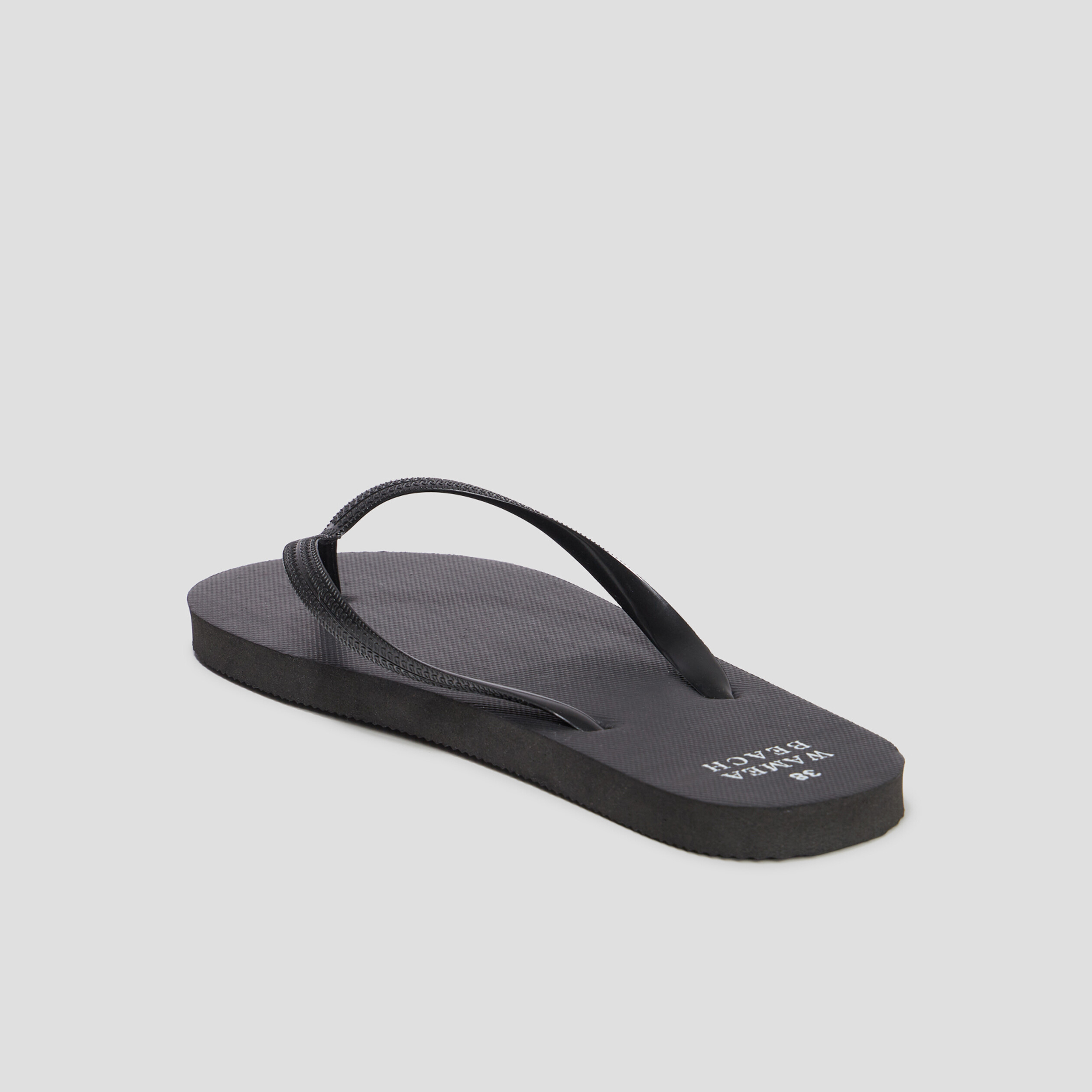 Tongs semelle plate noir femme