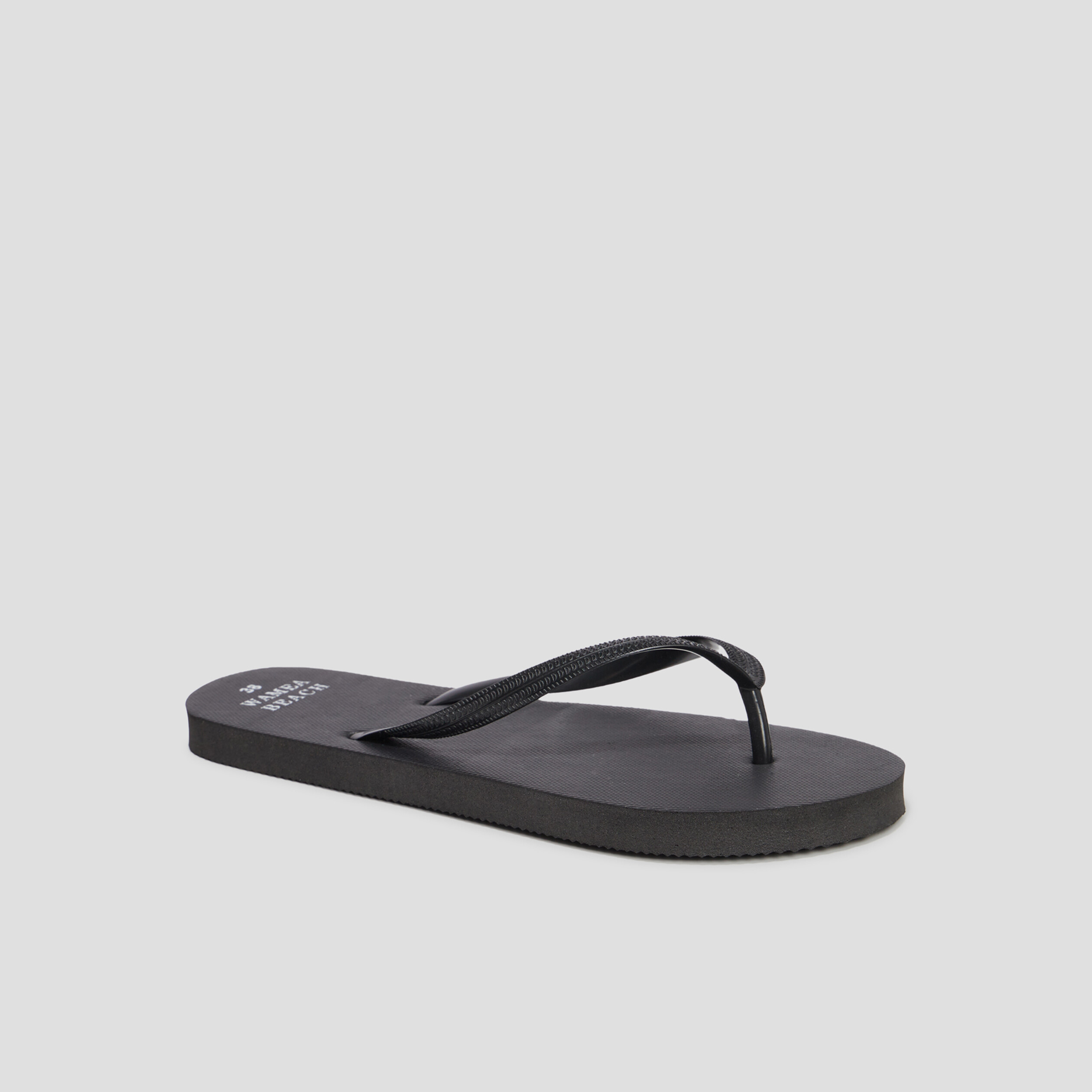Tongs semelle plate noir femme