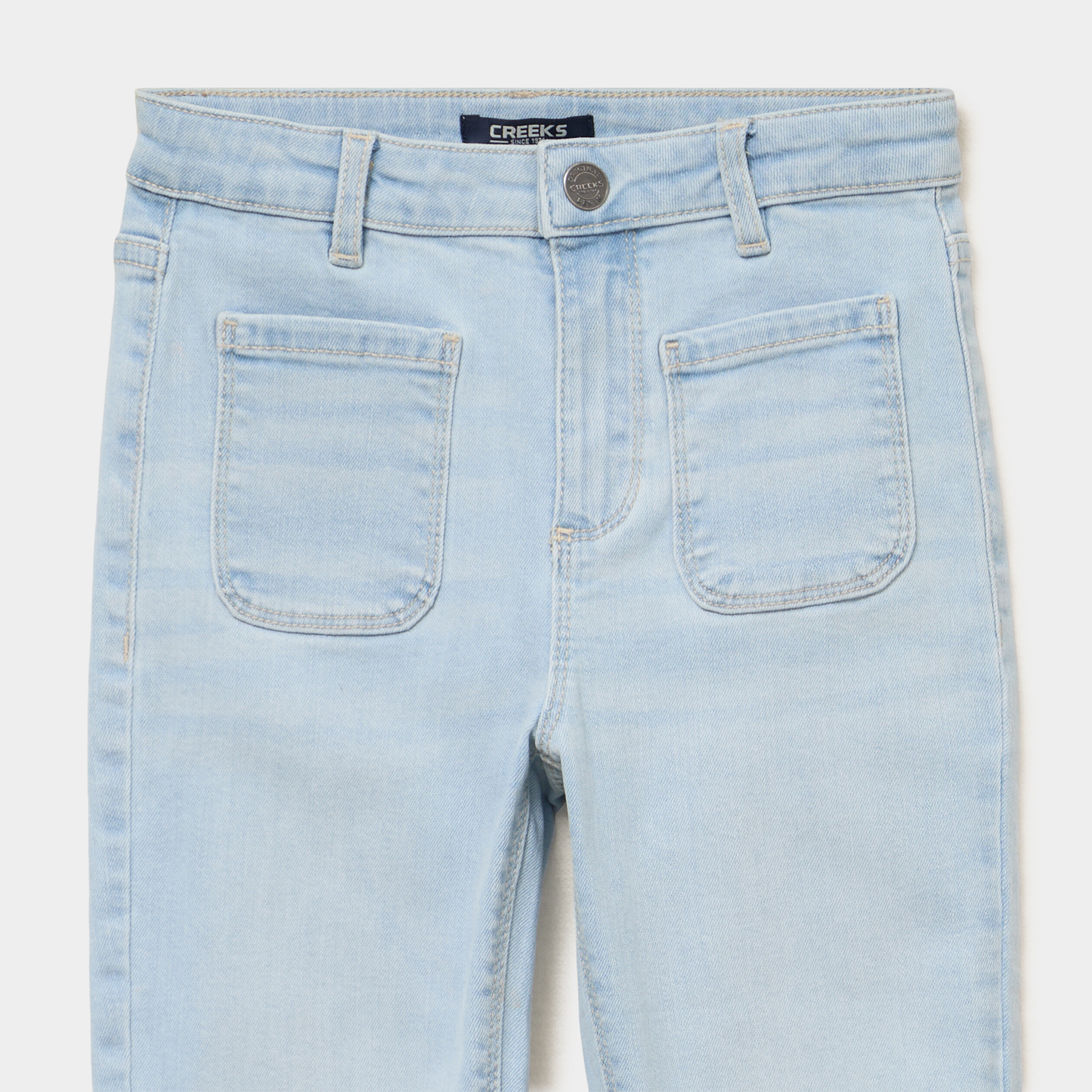 Jean flare poches plaqu&eacute;es denim bleach fille