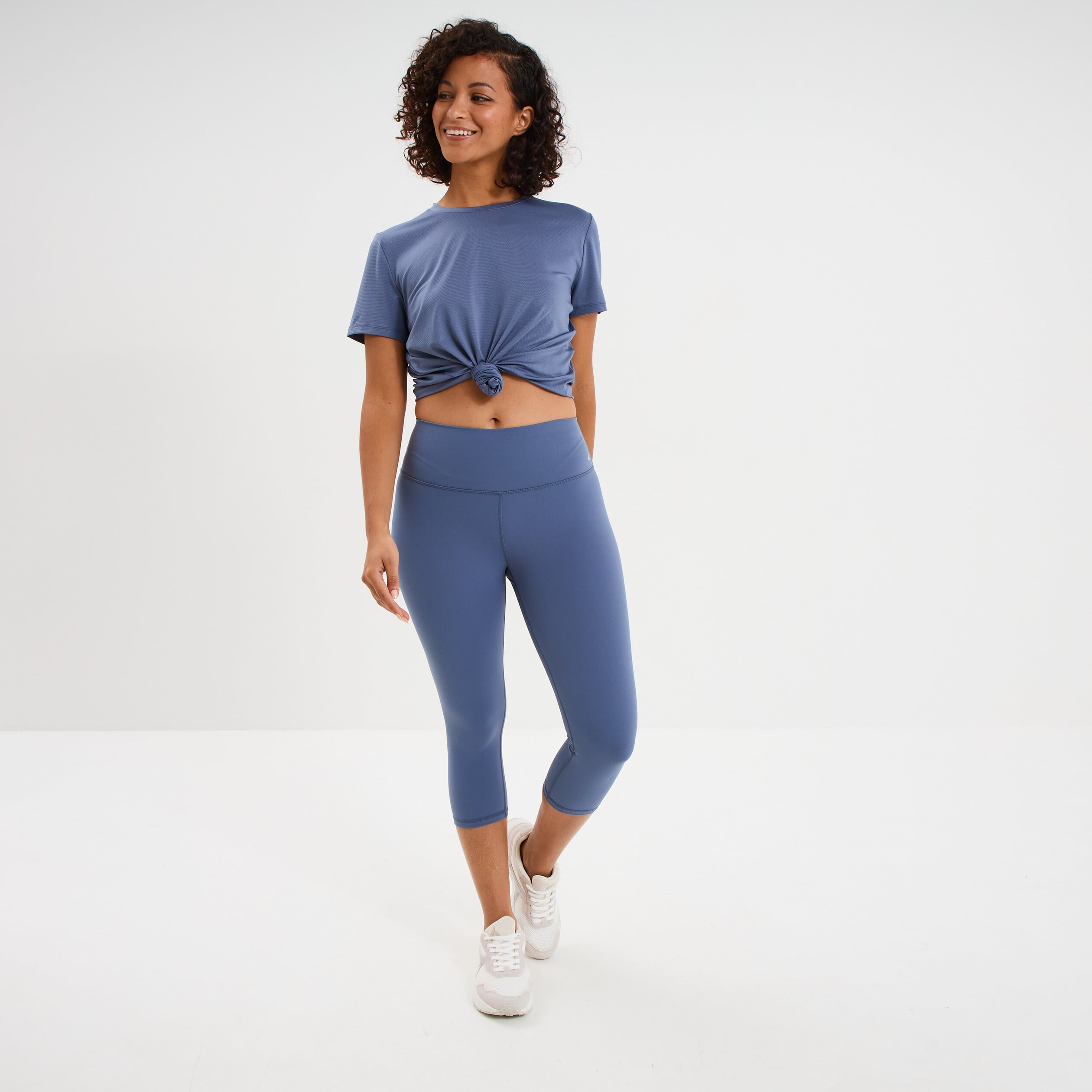 Legging corsaire de sport stretch bleu fonc&eacute; femme