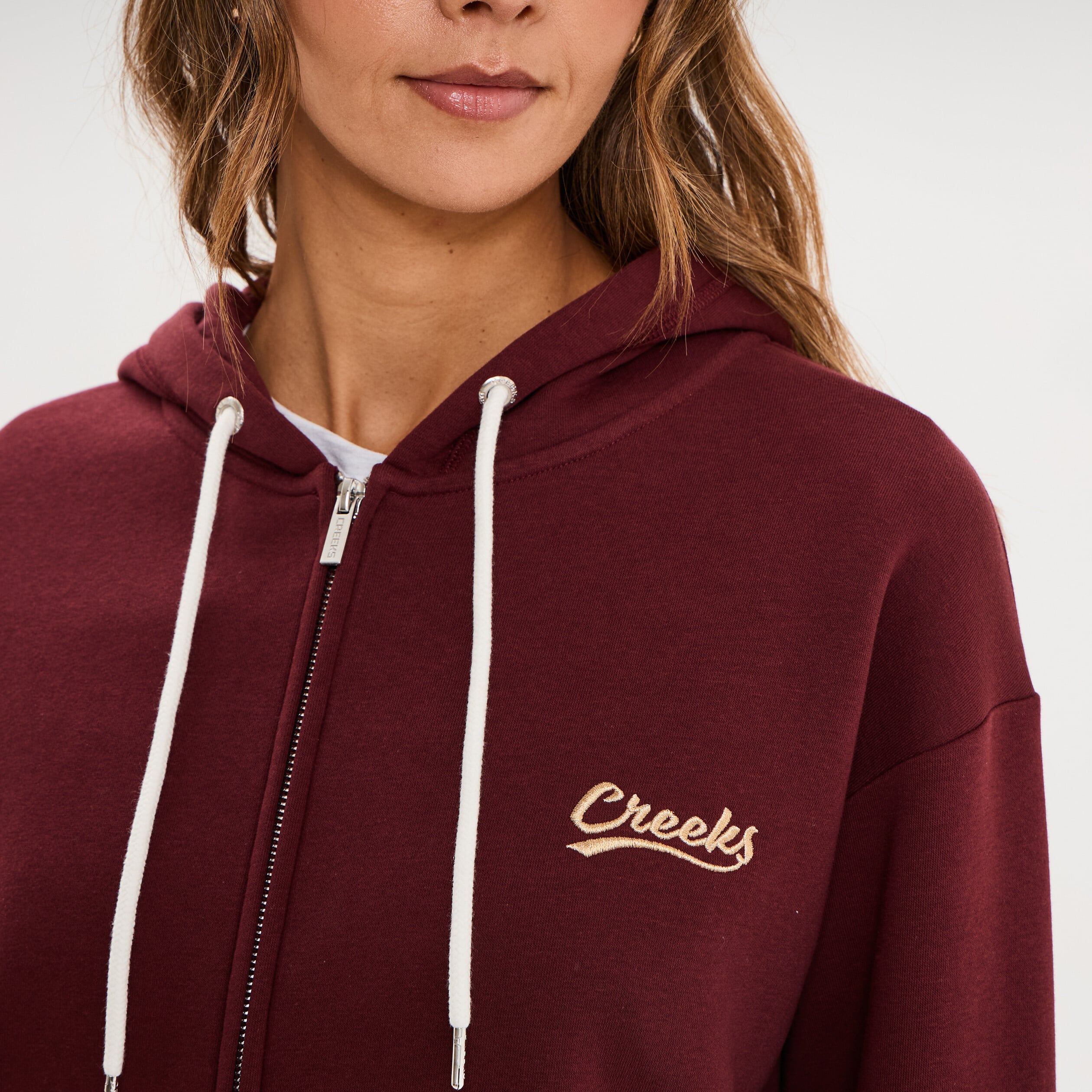 Sweat zipp&eacute; &agrave; capuche violet fonc&eacute; femme