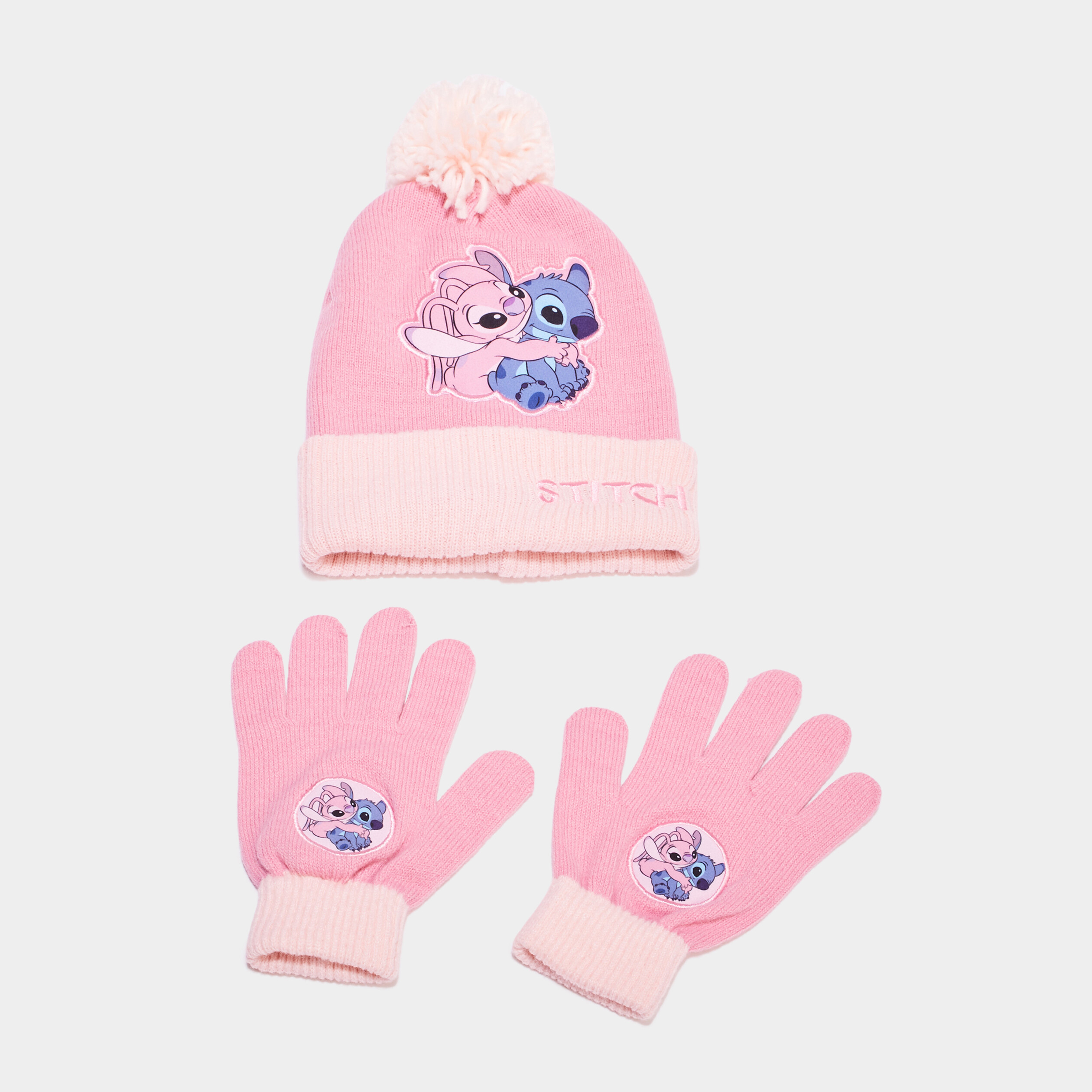 ensemble bonnet a pompom et gants stitch rose fille Ensemble bonnet à pompom et gants Stitch rose fille