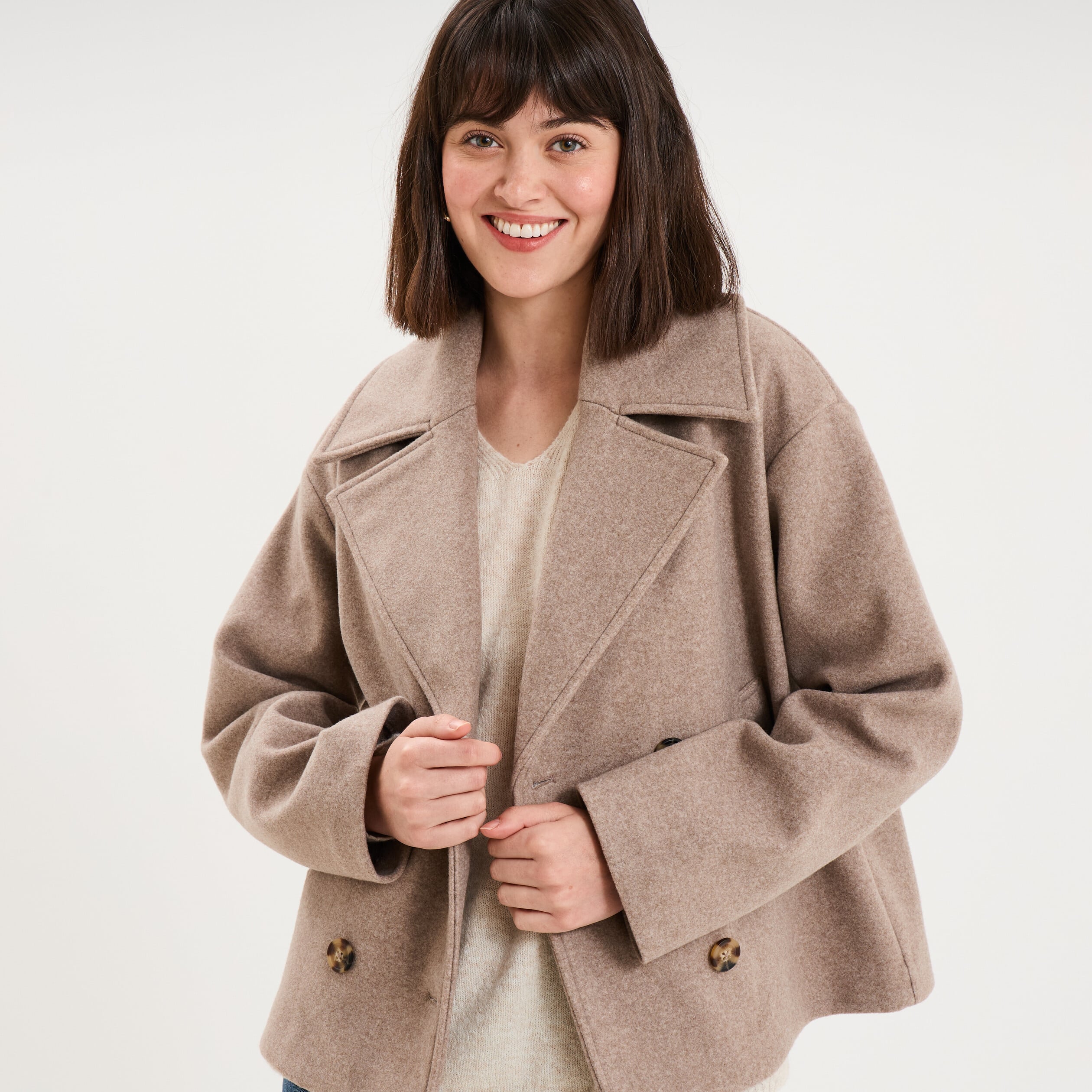 Manteau court double boutonnage beige femme