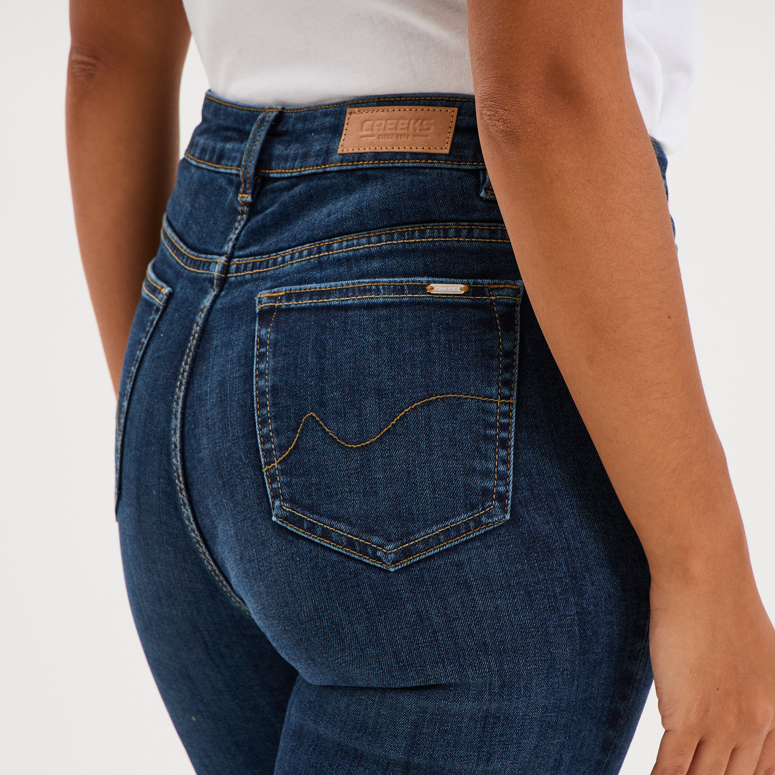 Jeans slim taille haute denim brut femme