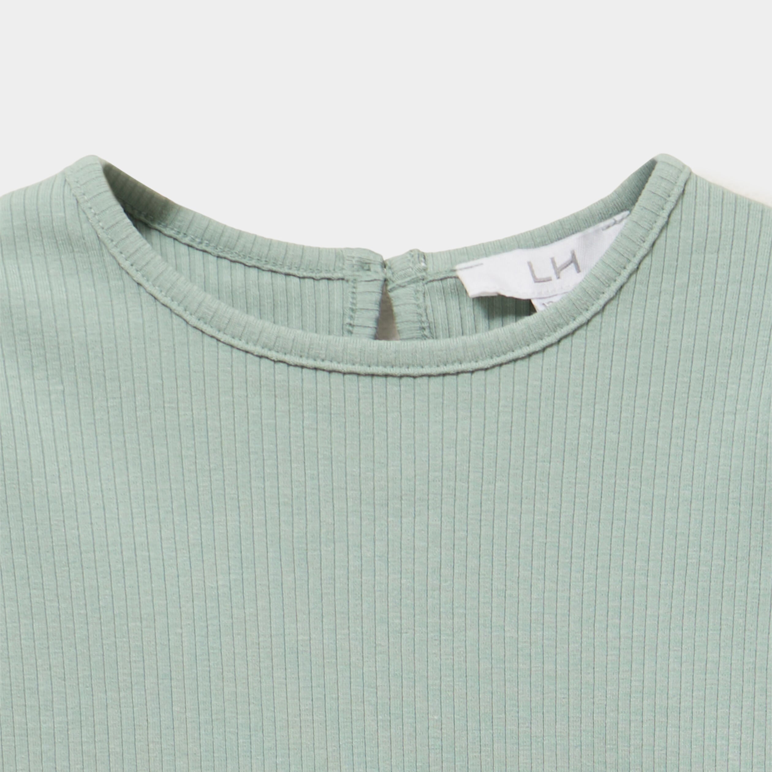 T-shirt c&ocirc;tel&eacute; volants aux &eacute;paules vert pastel b&eacute;b&eacute; fille