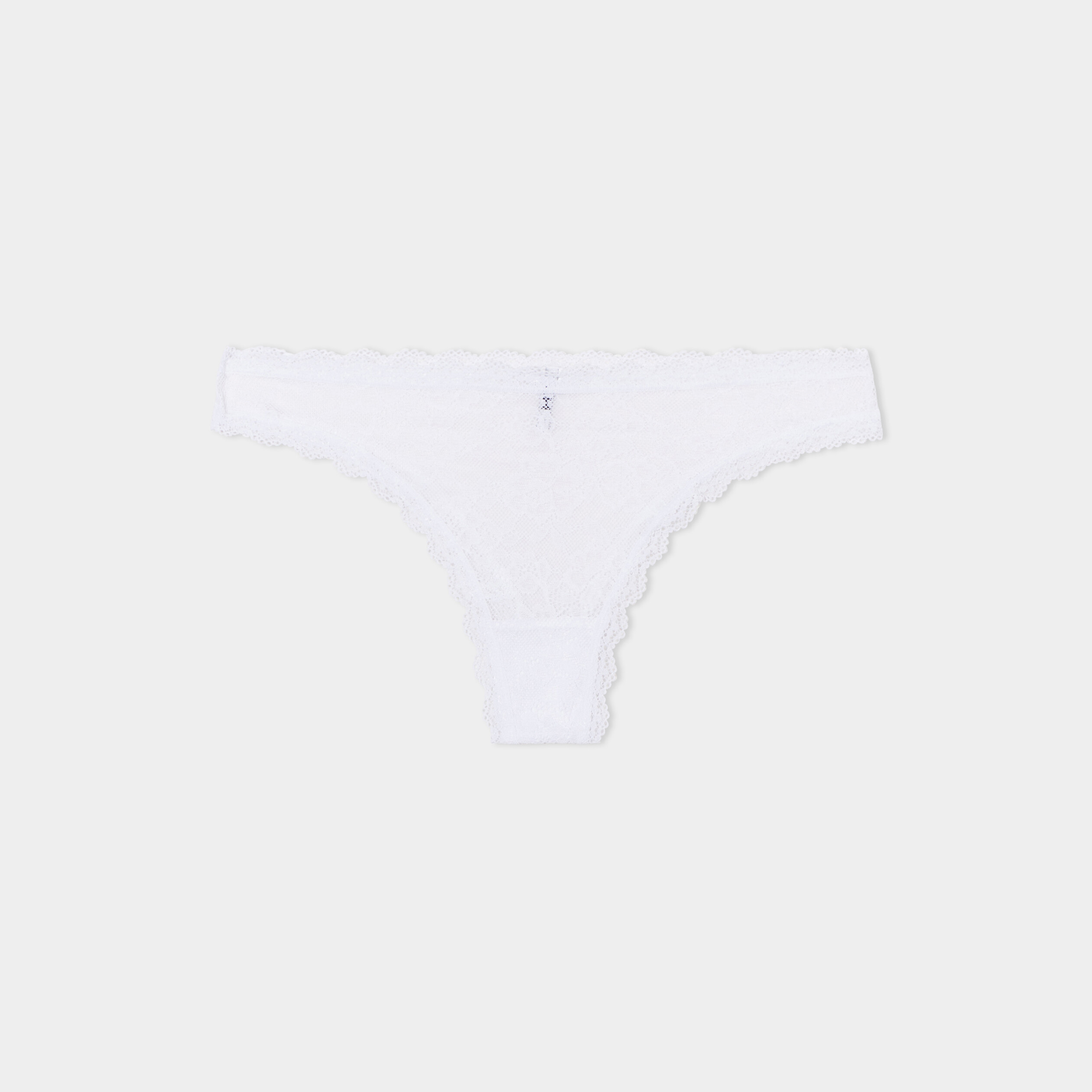 Tanga en dentelle doublure coton blanc femme