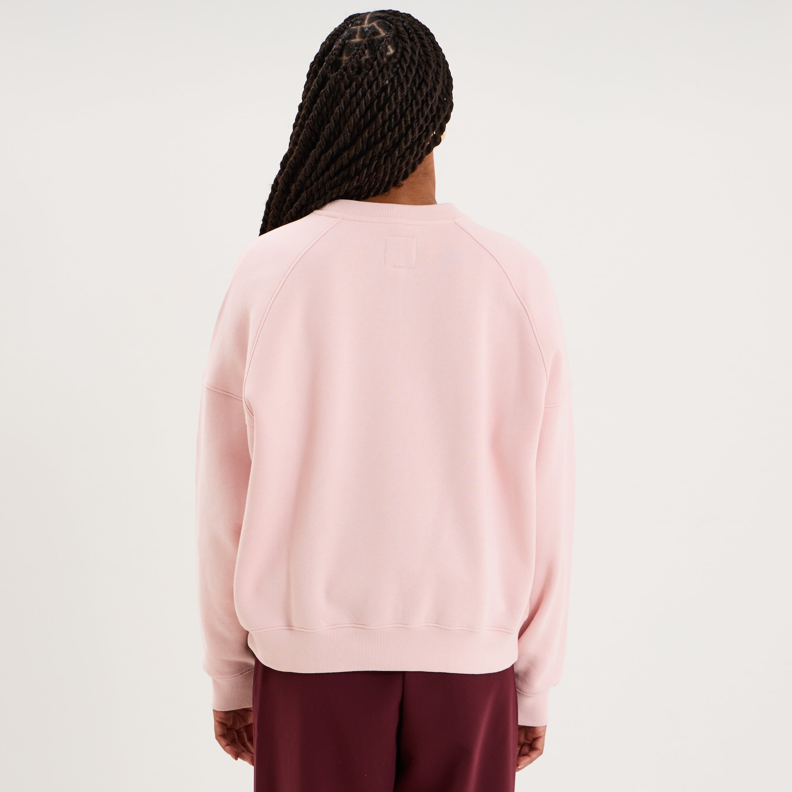 Sweat col rond oversize manches longues rose pastel femme