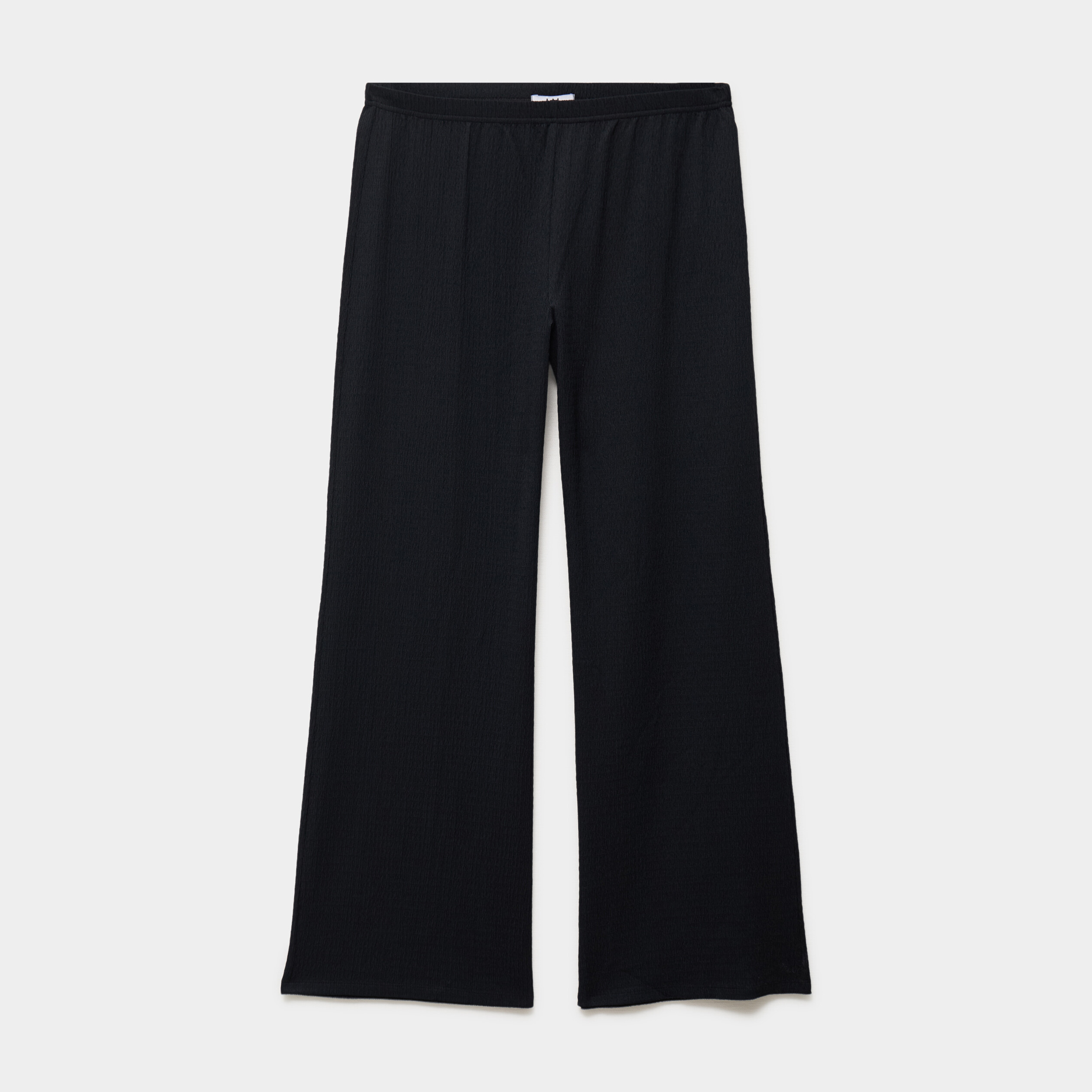 Pantalon effet gaufr&eacute; fluide noir femme