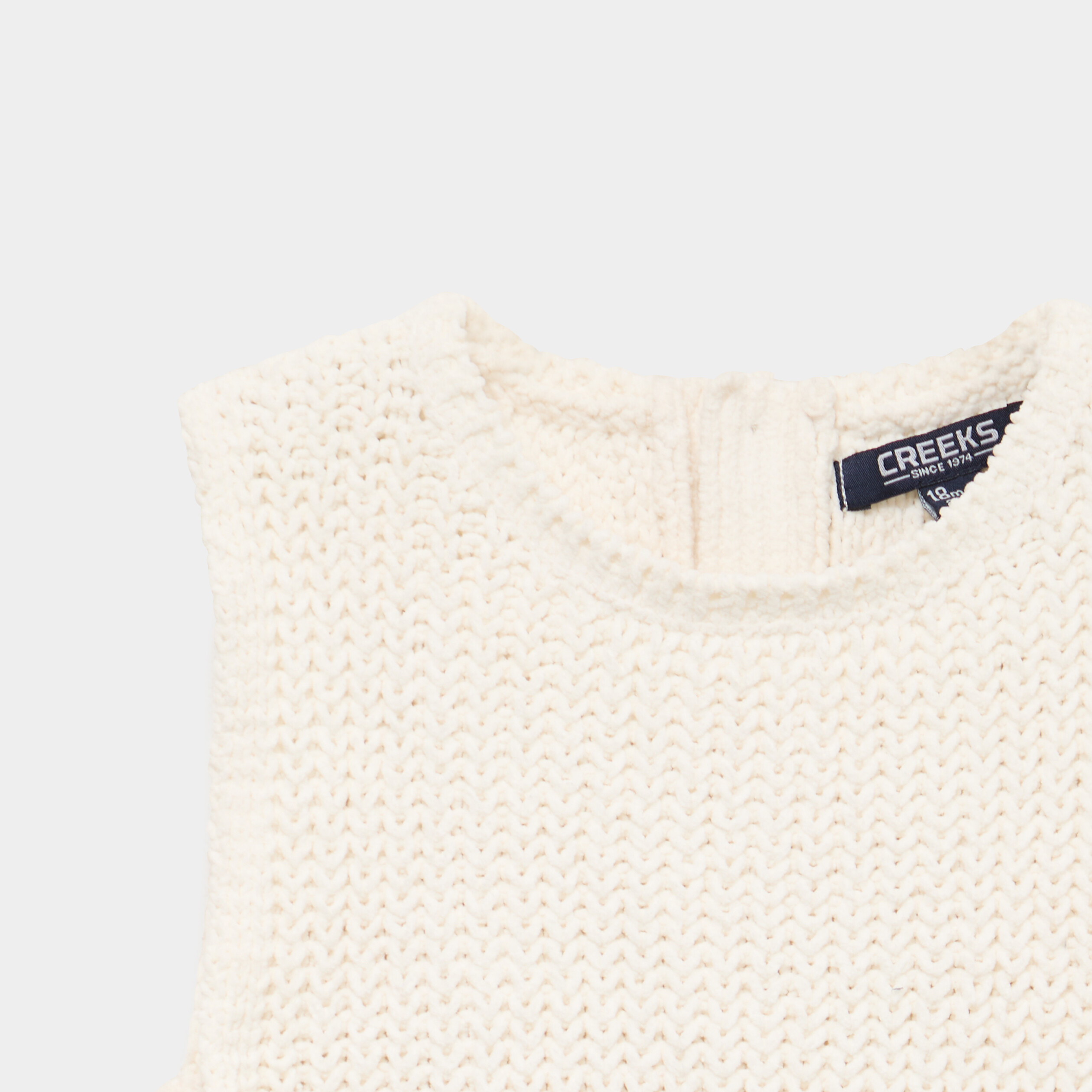 Pull sans manches nou&eacute; blanc b&eacute;b&eacute; fille