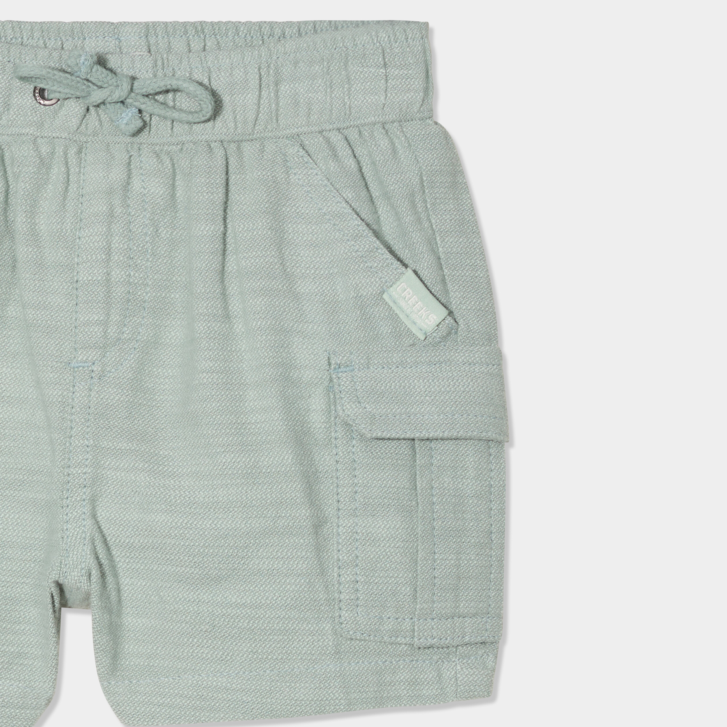short poches battle coton vert pastel bebeg Short poches battle coton vert pastel bébé garçon