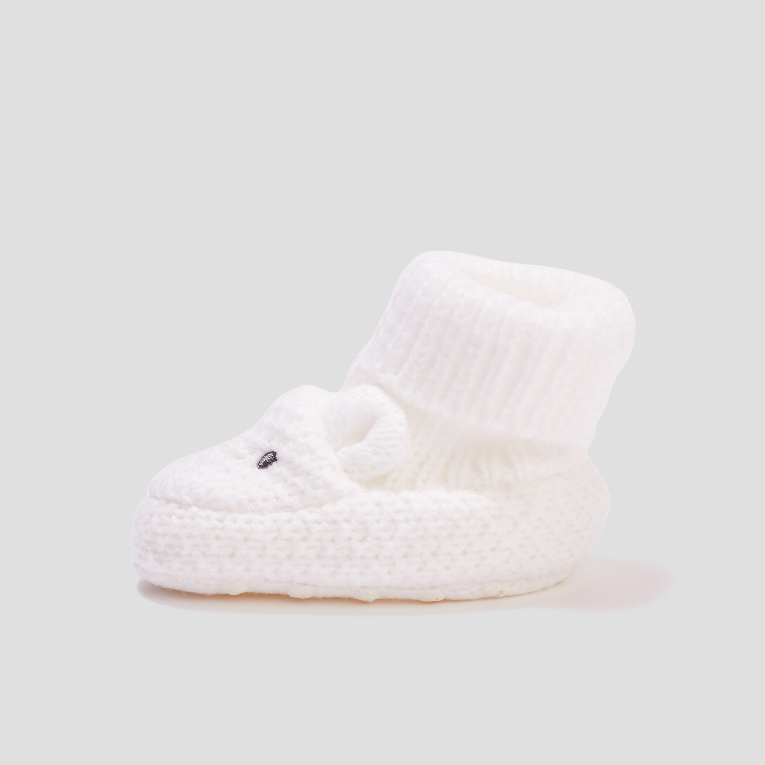 chaussettes dinterieur tricotees ivoire bebef Chaussettes d'intérieur tricotées ivoire bébé fille