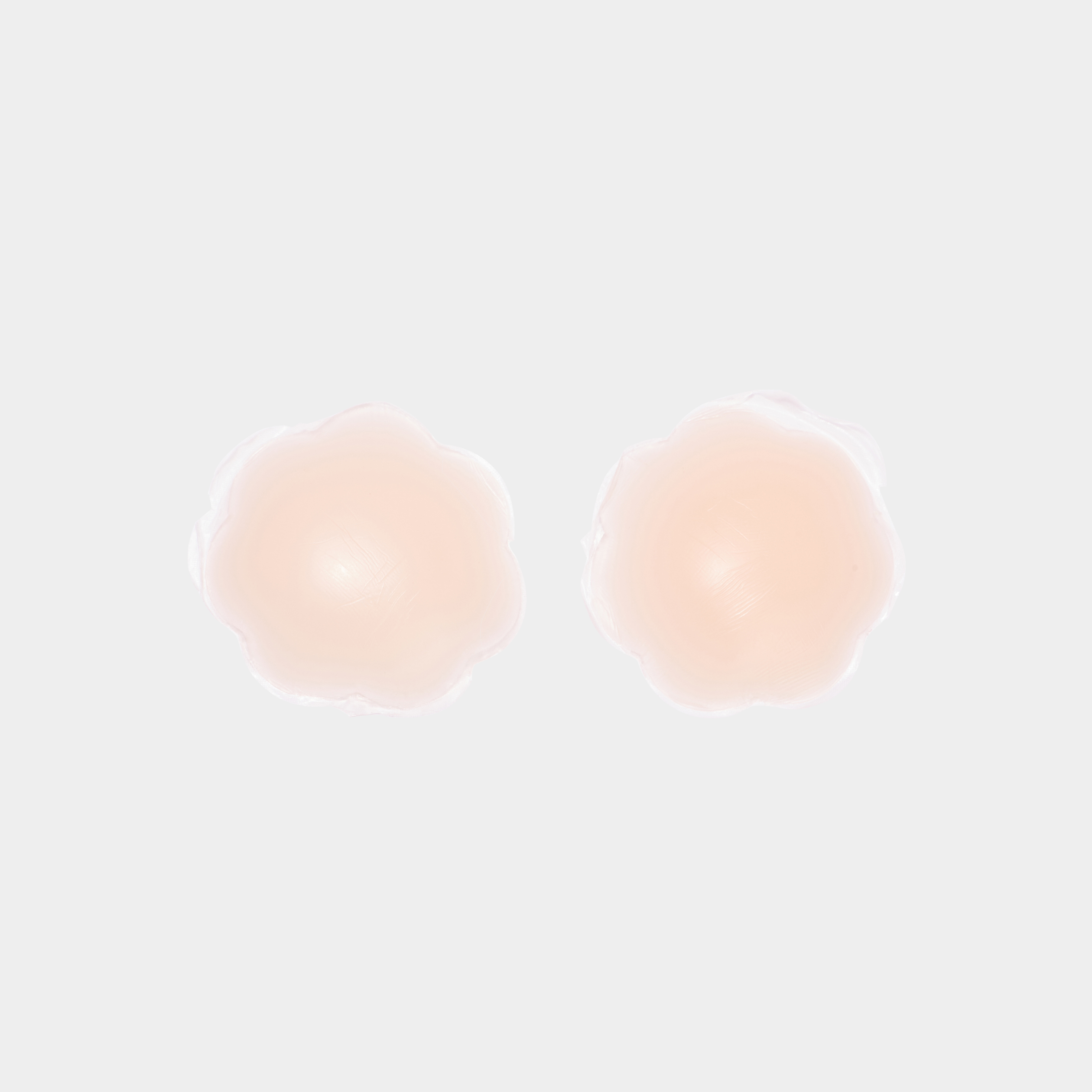 Cache-t&eacute;tons r&eacute;utilisables en silicone beige femme