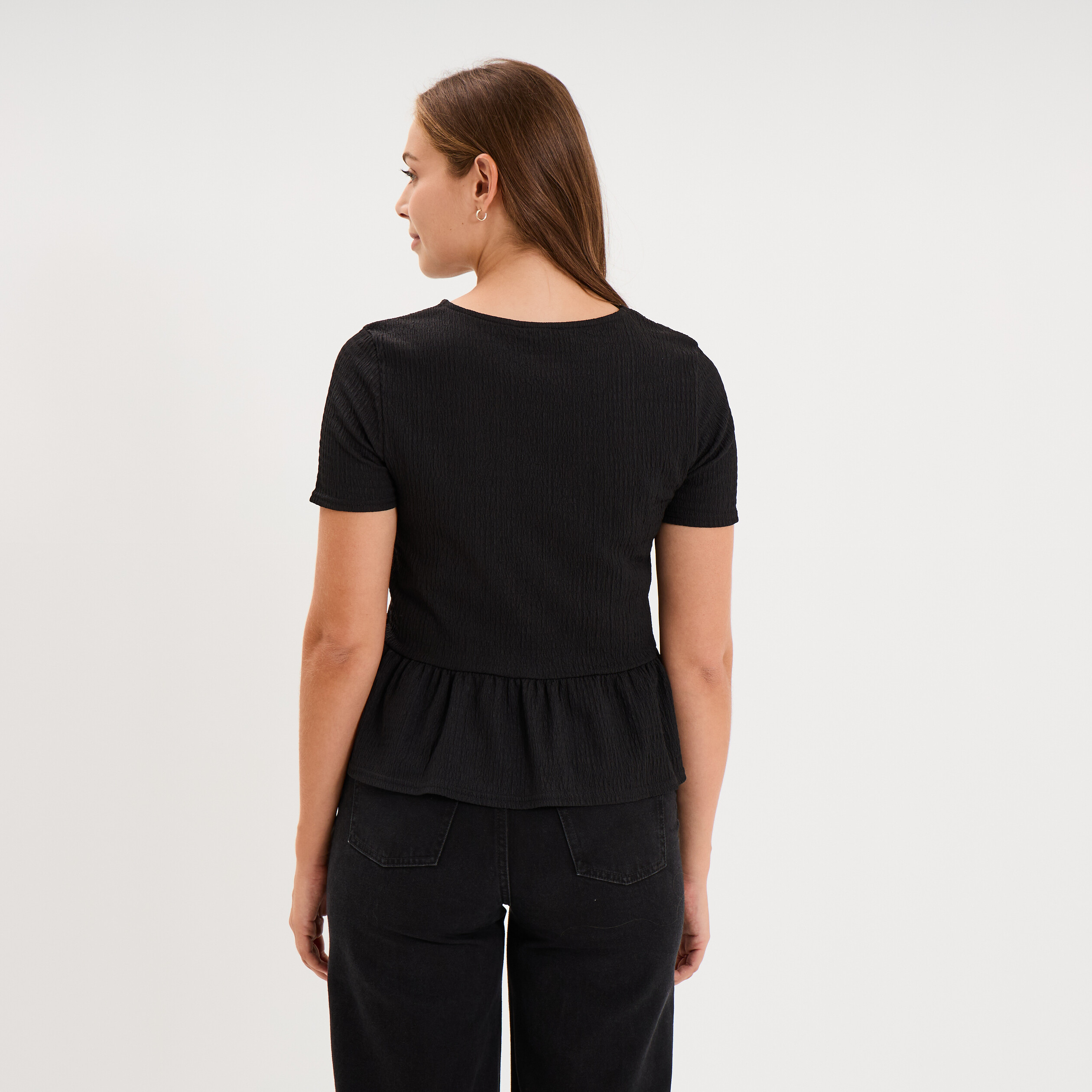T-shirt gaufr&eacute; taille &agrave; volants noir femme