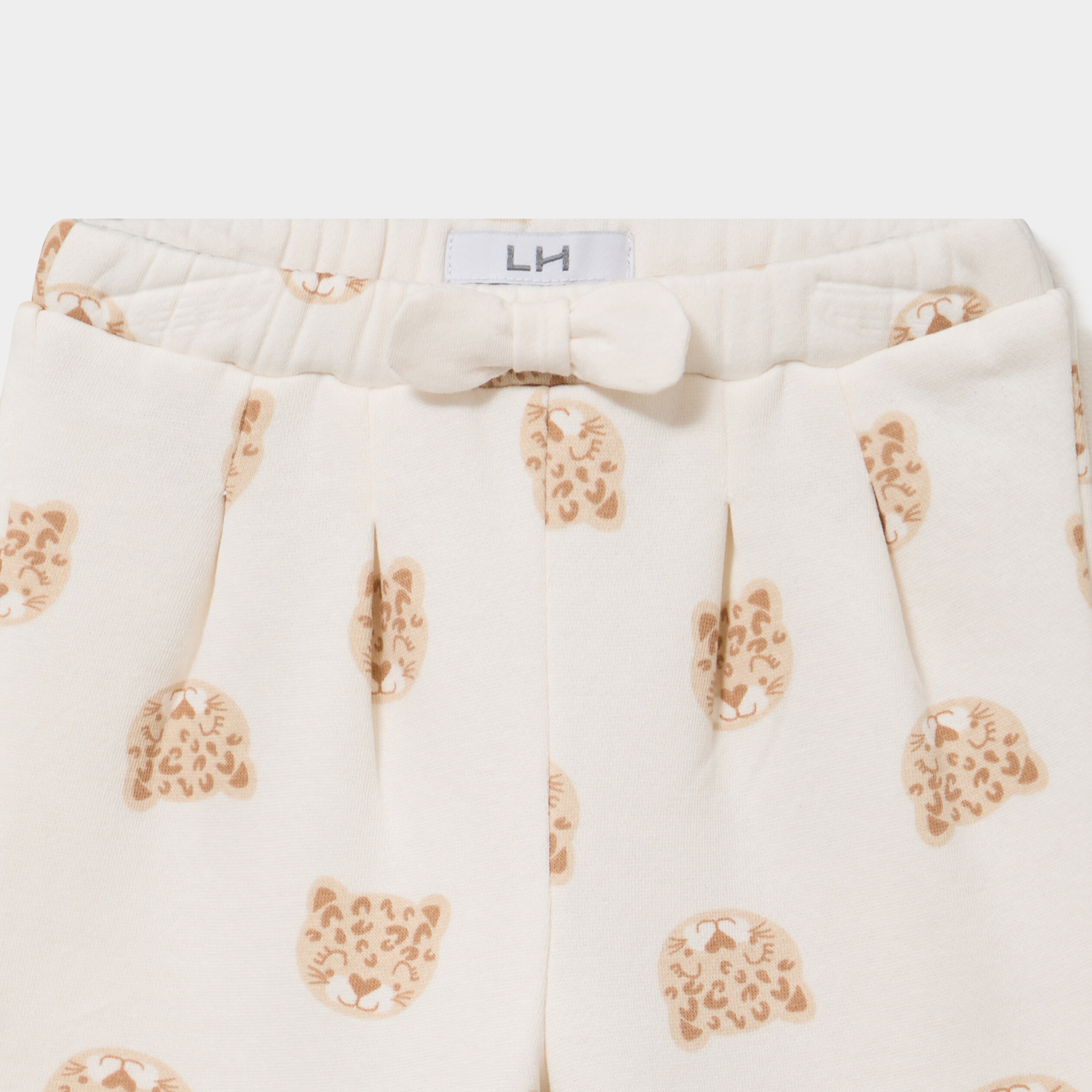 Pantalon de jogging molleton &agrave; noeud ecru b&eacute;b&eacute; fille