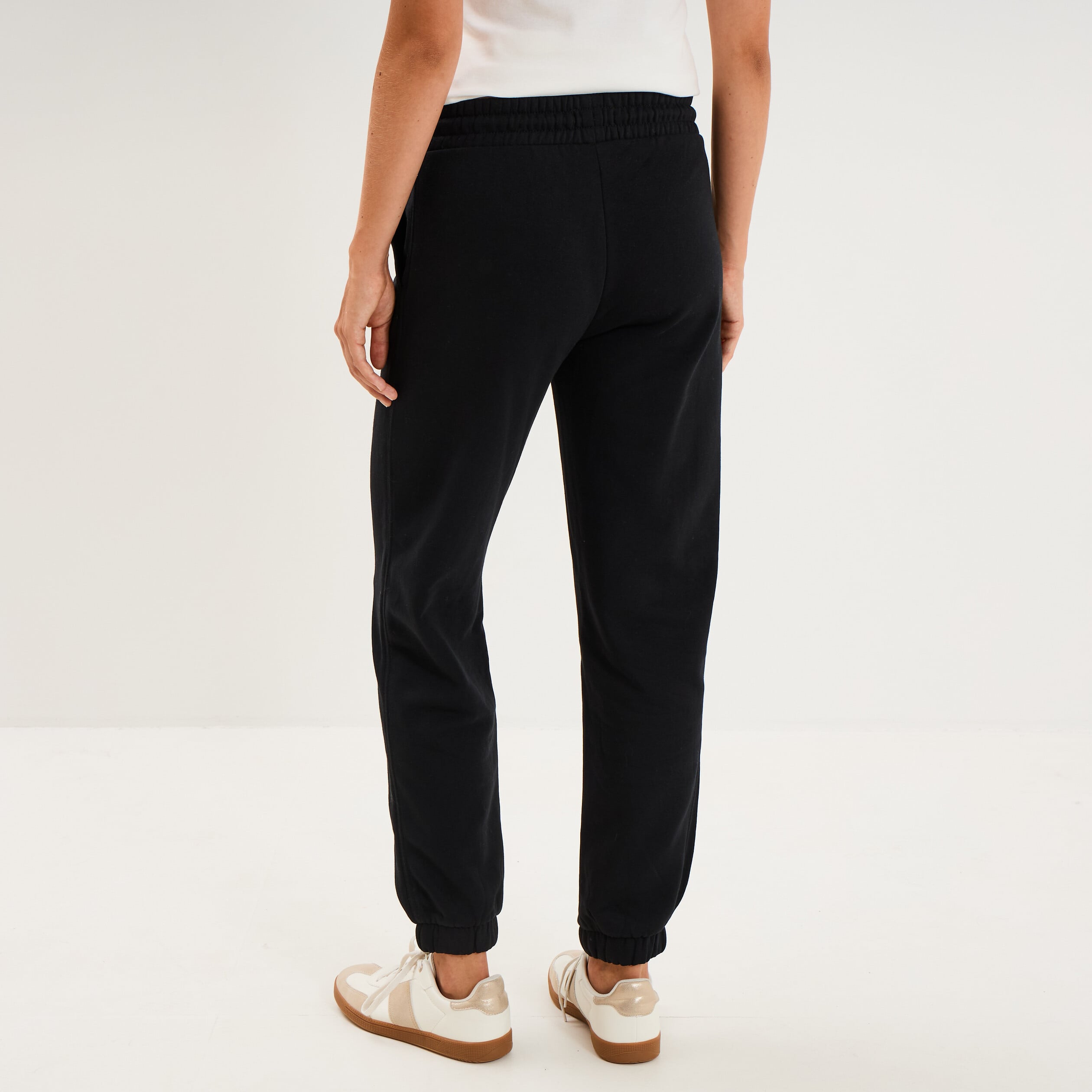 Pantalon de jogging molletonn&eacute; noir femme