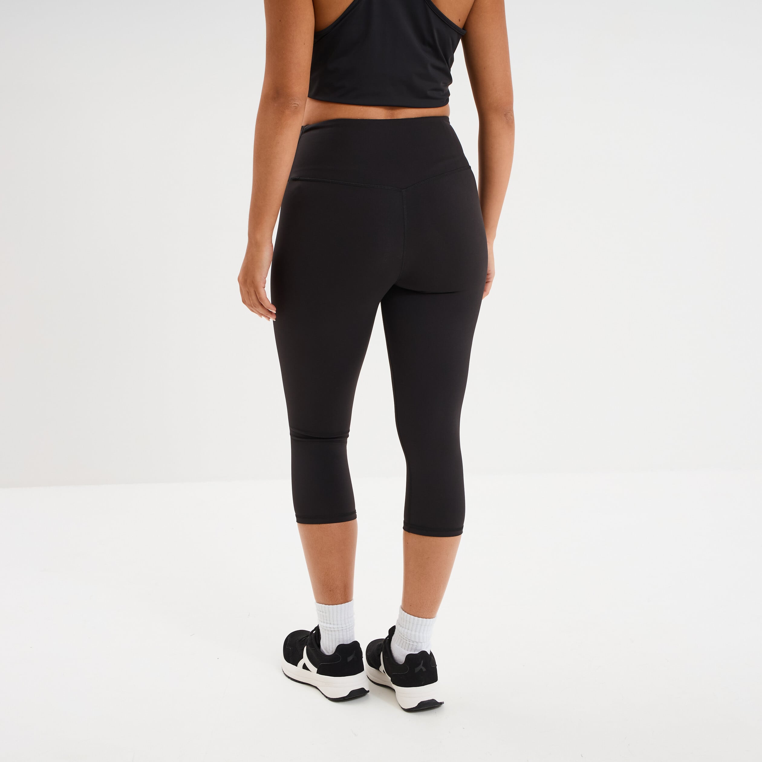 Legging corsaire de sport stretch noir femme