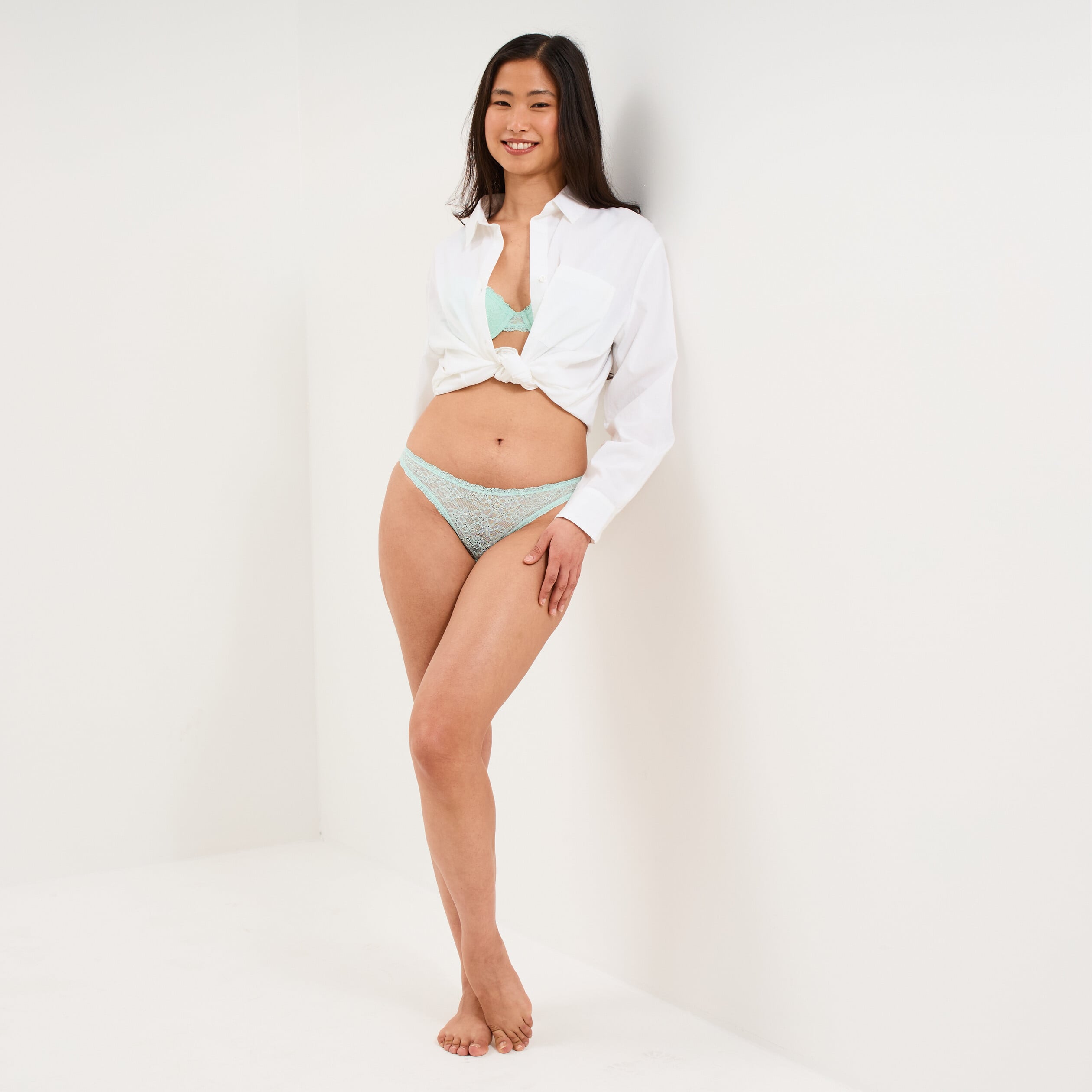 Tanga en dentelle doublure coton vert turquoise femme