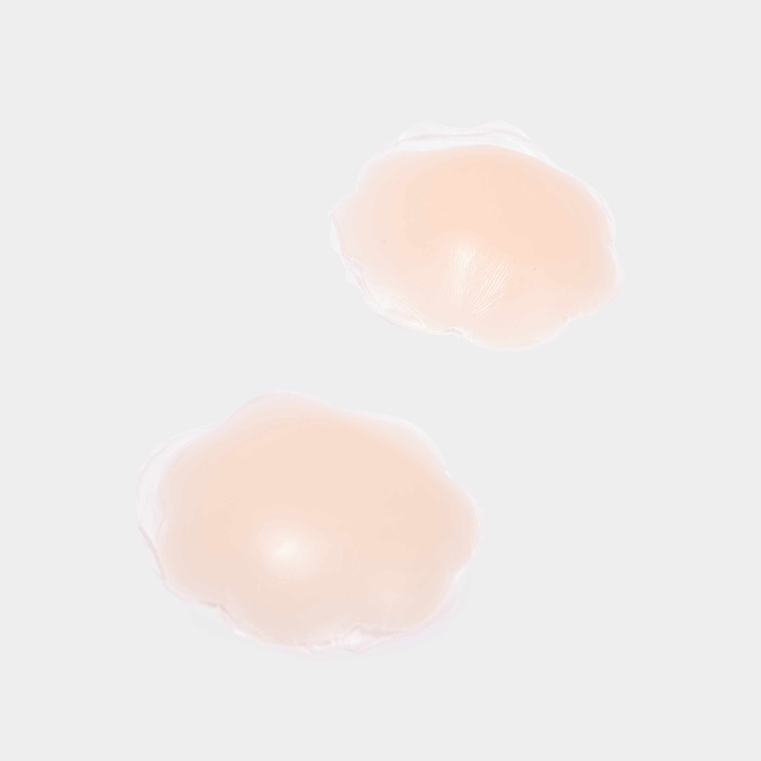 Cache-t&eacute;tons r&eacute;utilisables en silicone beige femme