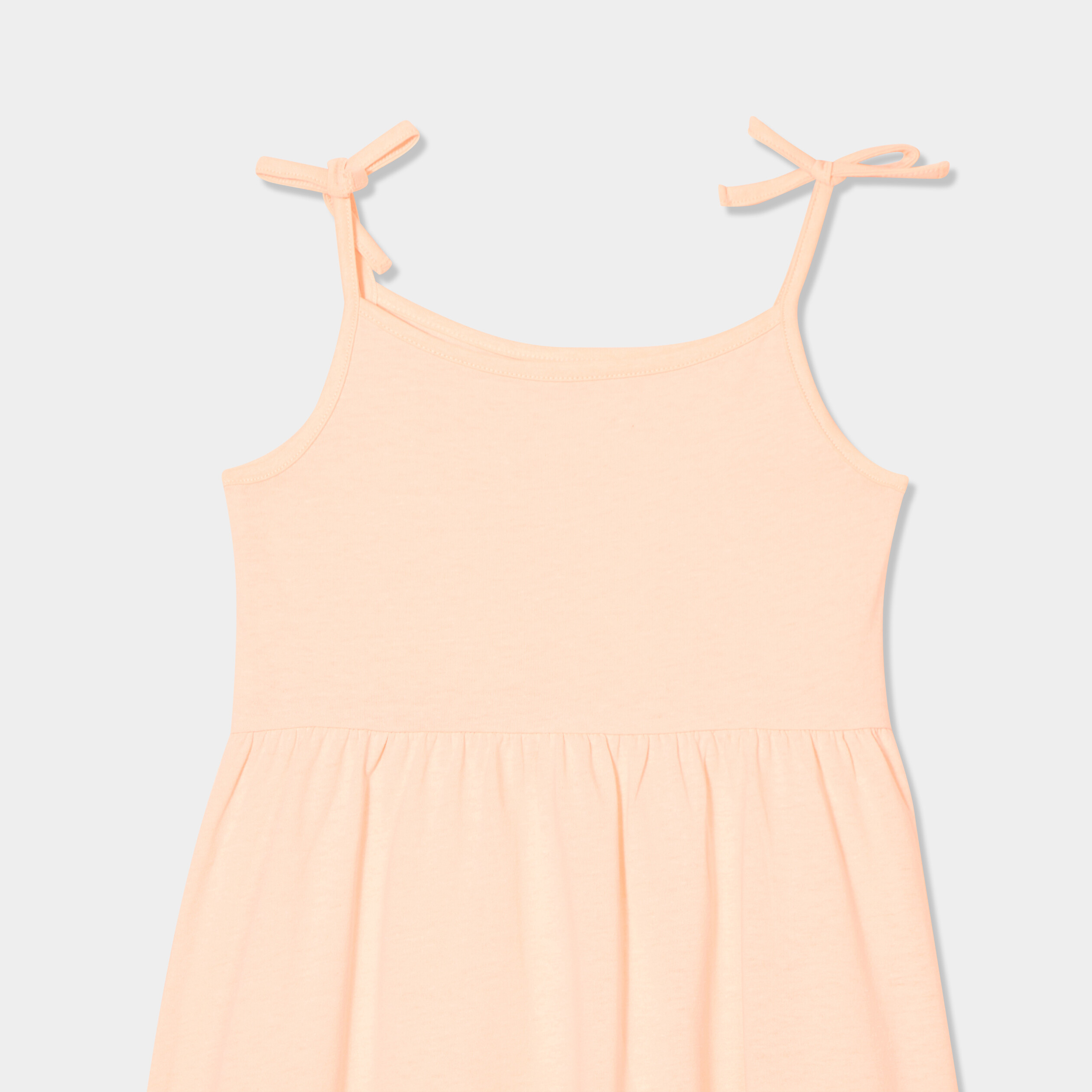 Robe courte bretelles nou&eacute;es &eacute;vas&eacute;e orange fluo fille