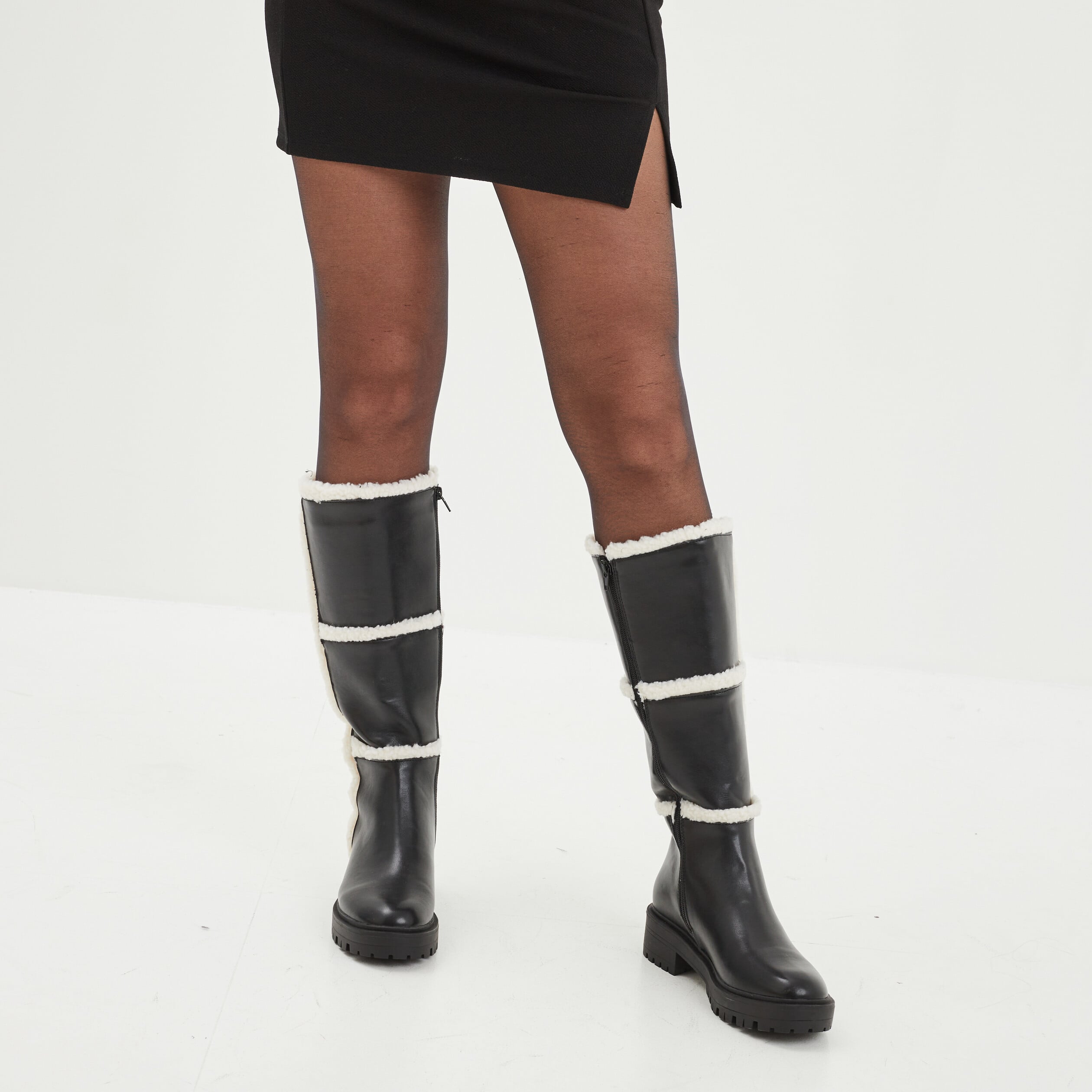 Bottes bandes fausse laine mouton noir femme